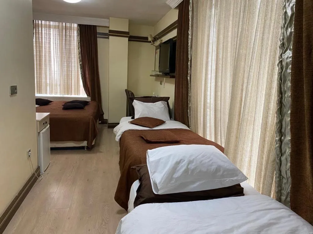 Bed in Gloria Tibi Hotel