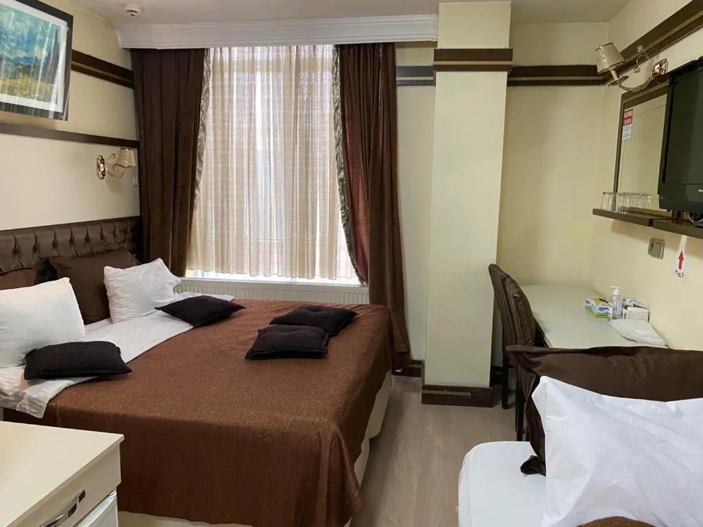 Bed in Gloria Tibi Hotel