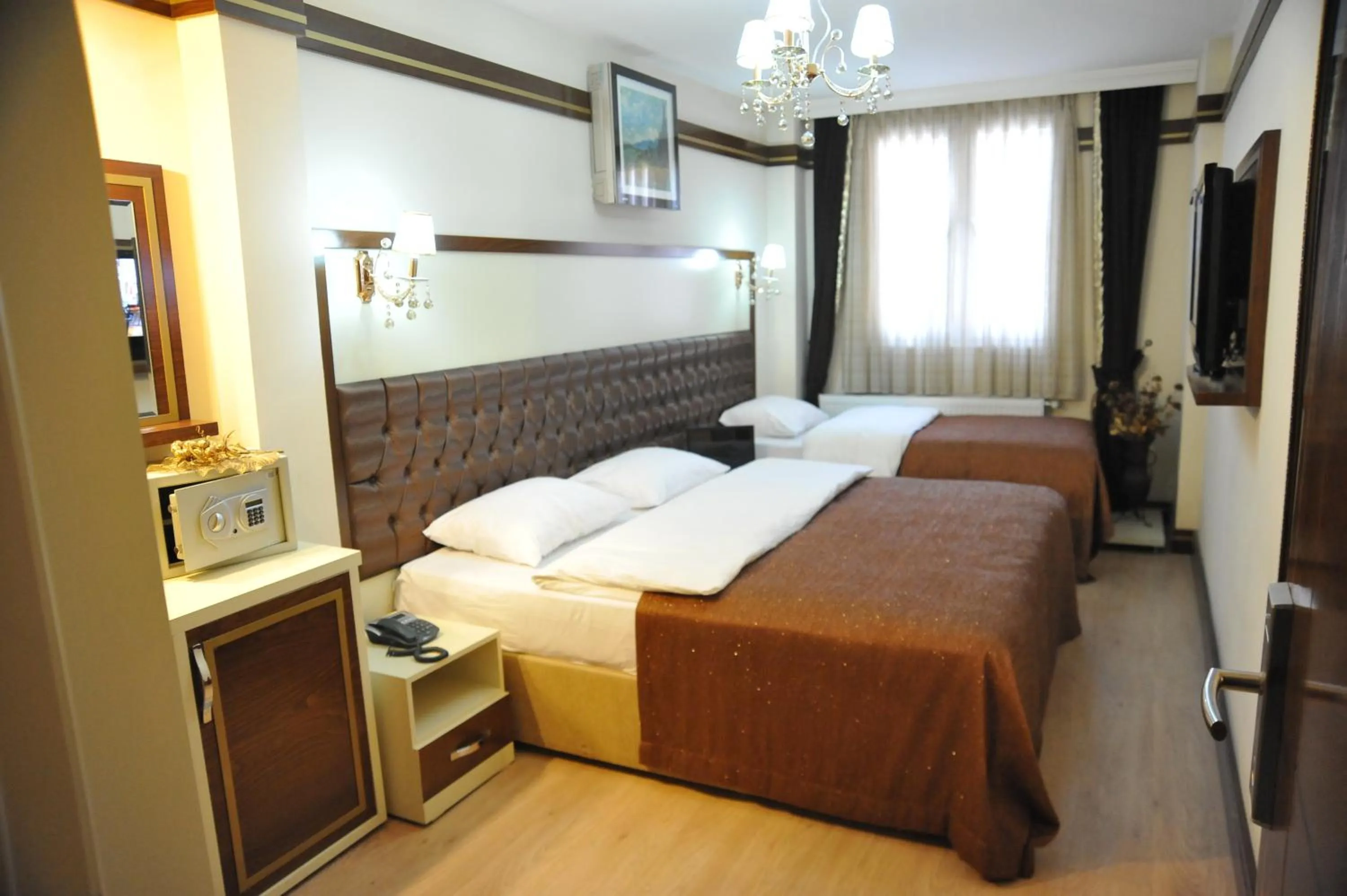 Photo of the whole room, Bed in Gloria Tibi Hotel