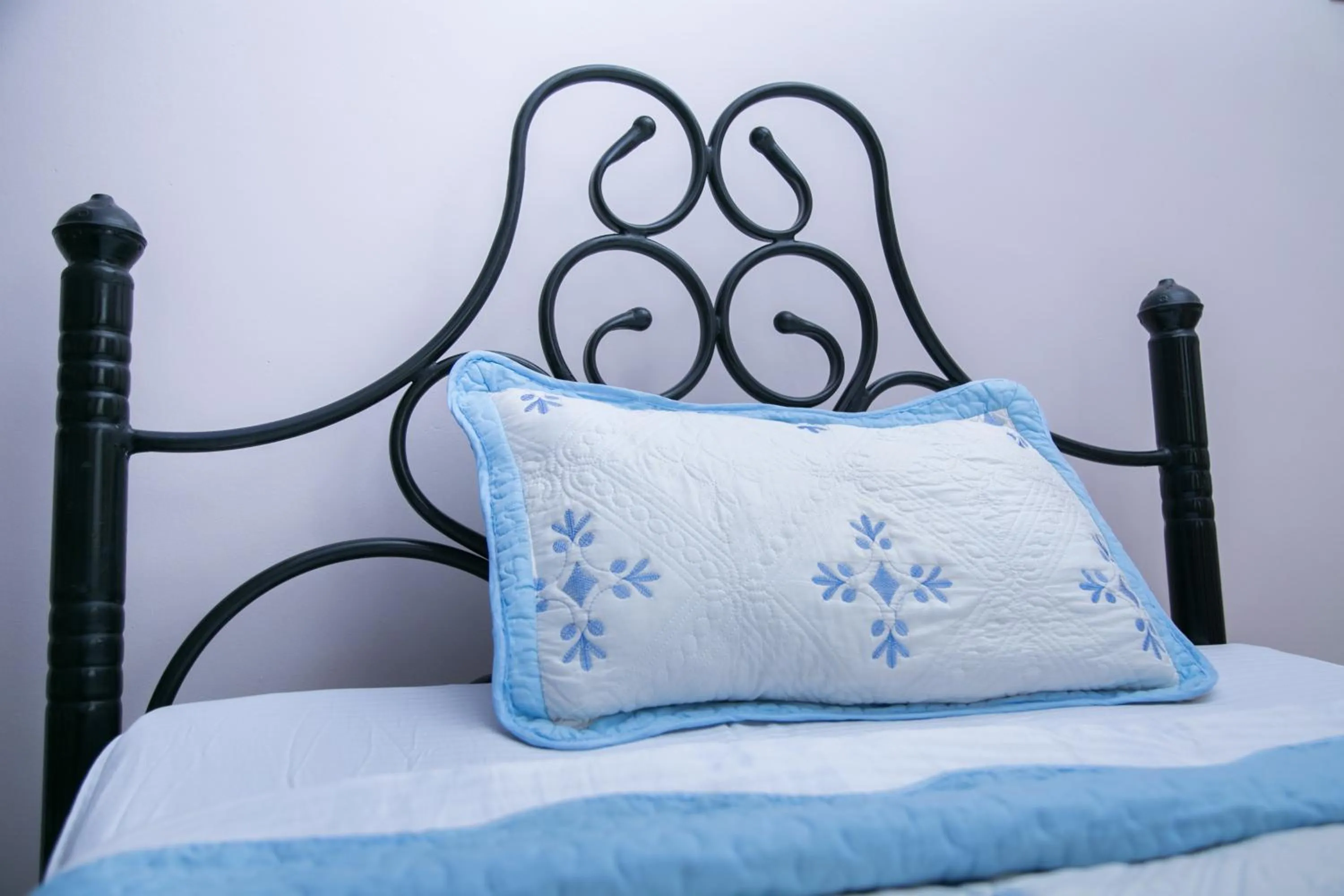 Bed in Red Sox Hotel Ltd