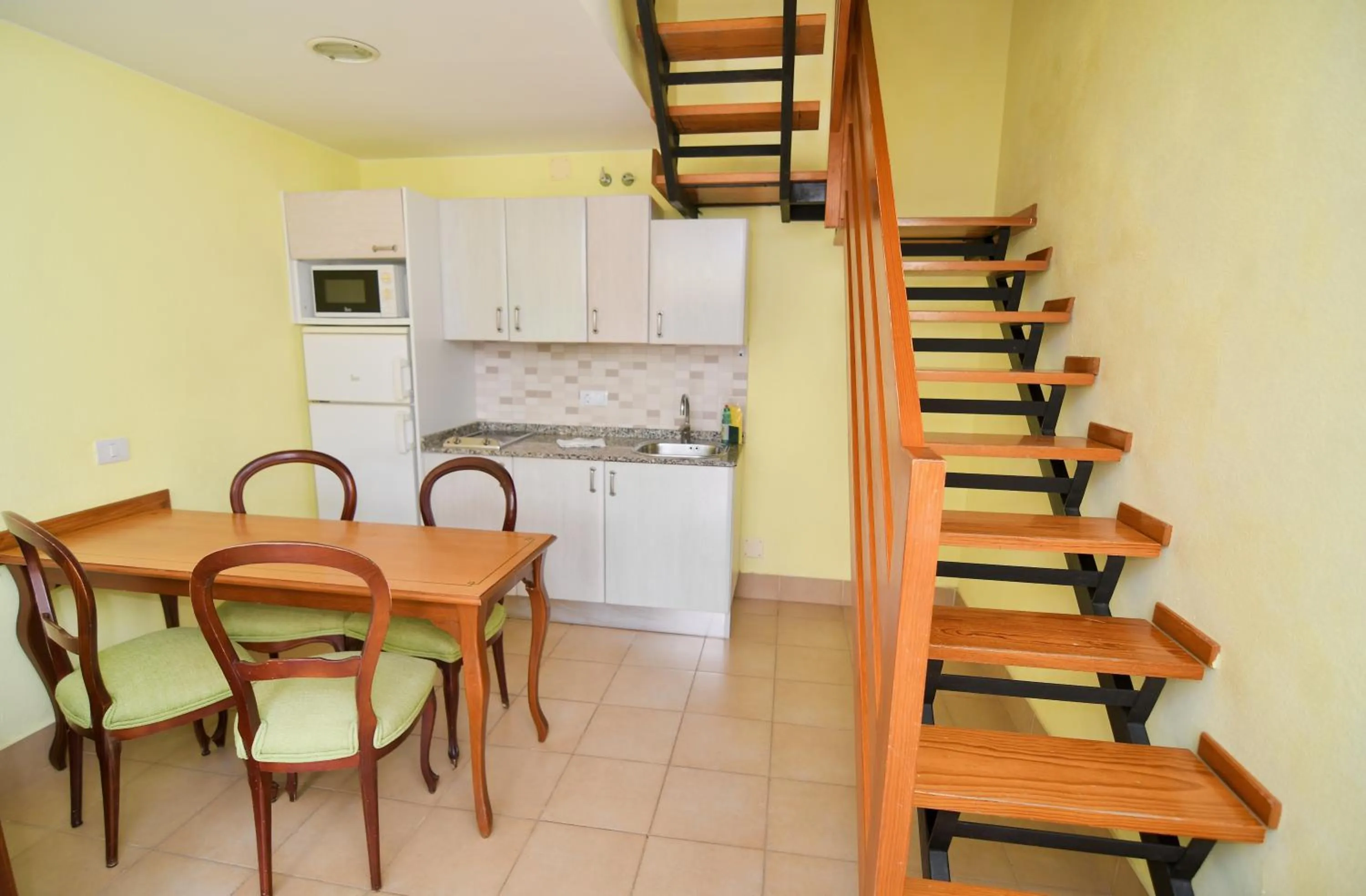 Kitchen or kitchenette in Playamar Bungalows