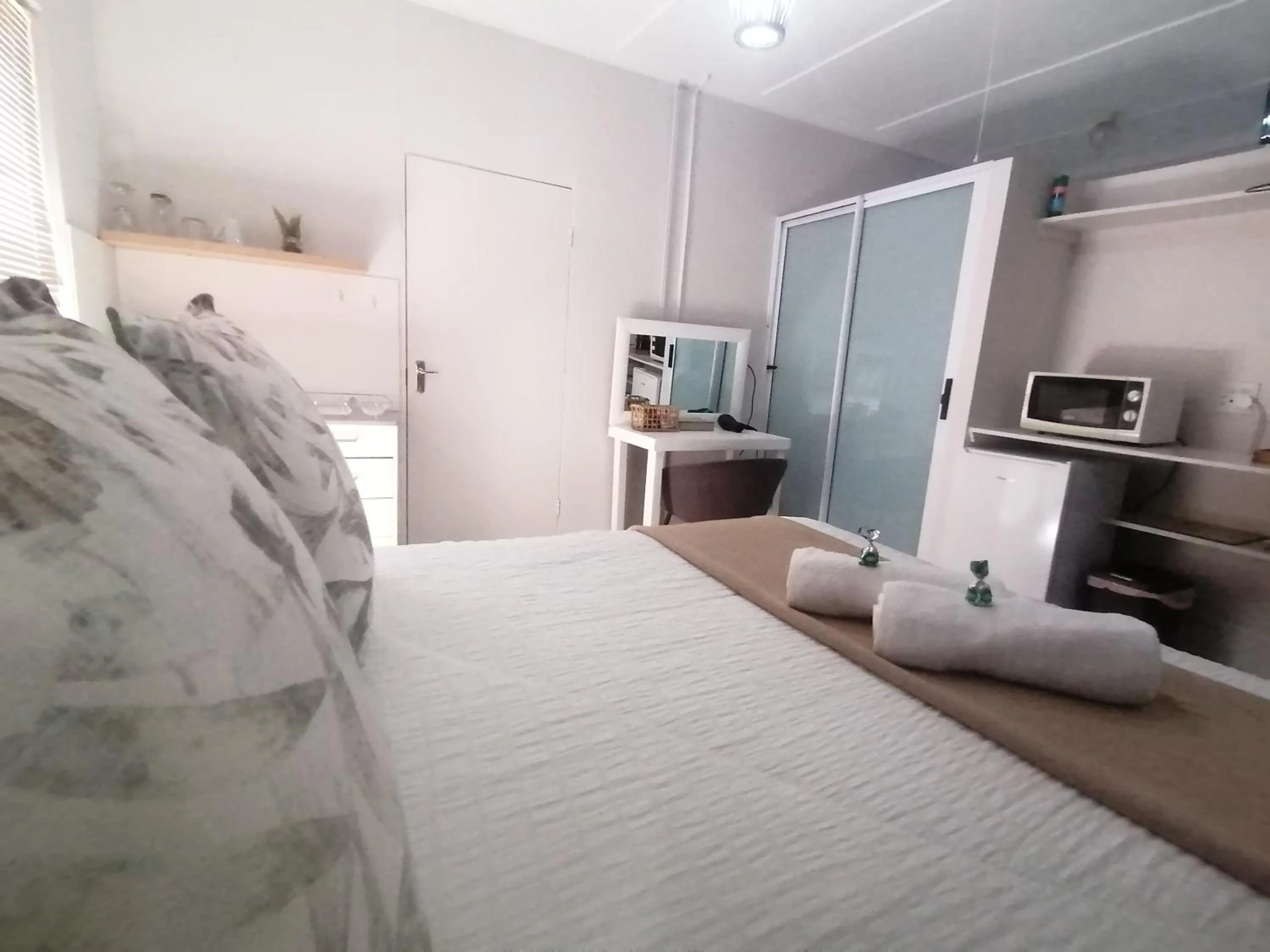 Bed in Oppi Draai Guesthouse