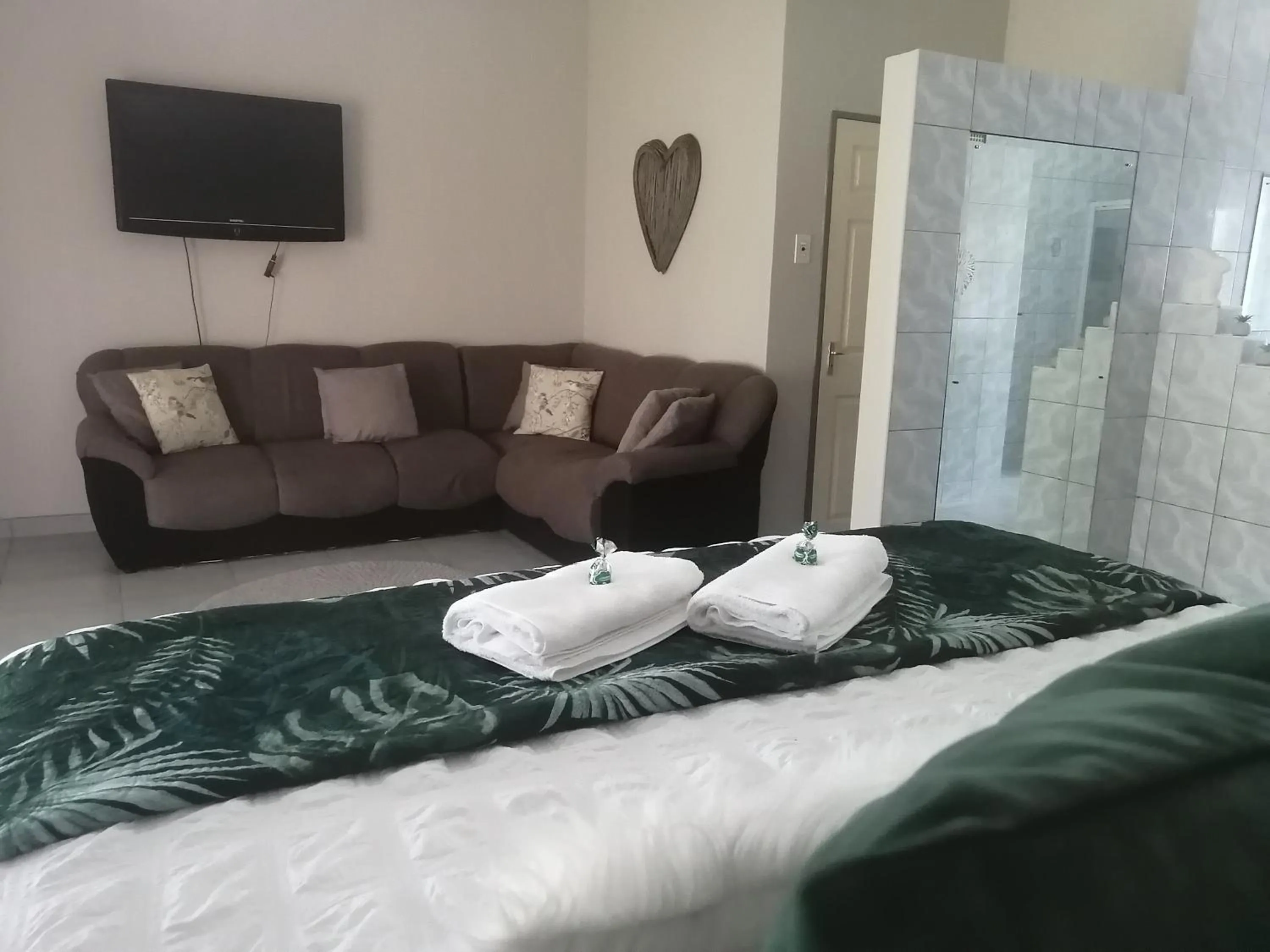 Bed in Oppi Draai Guesthouse