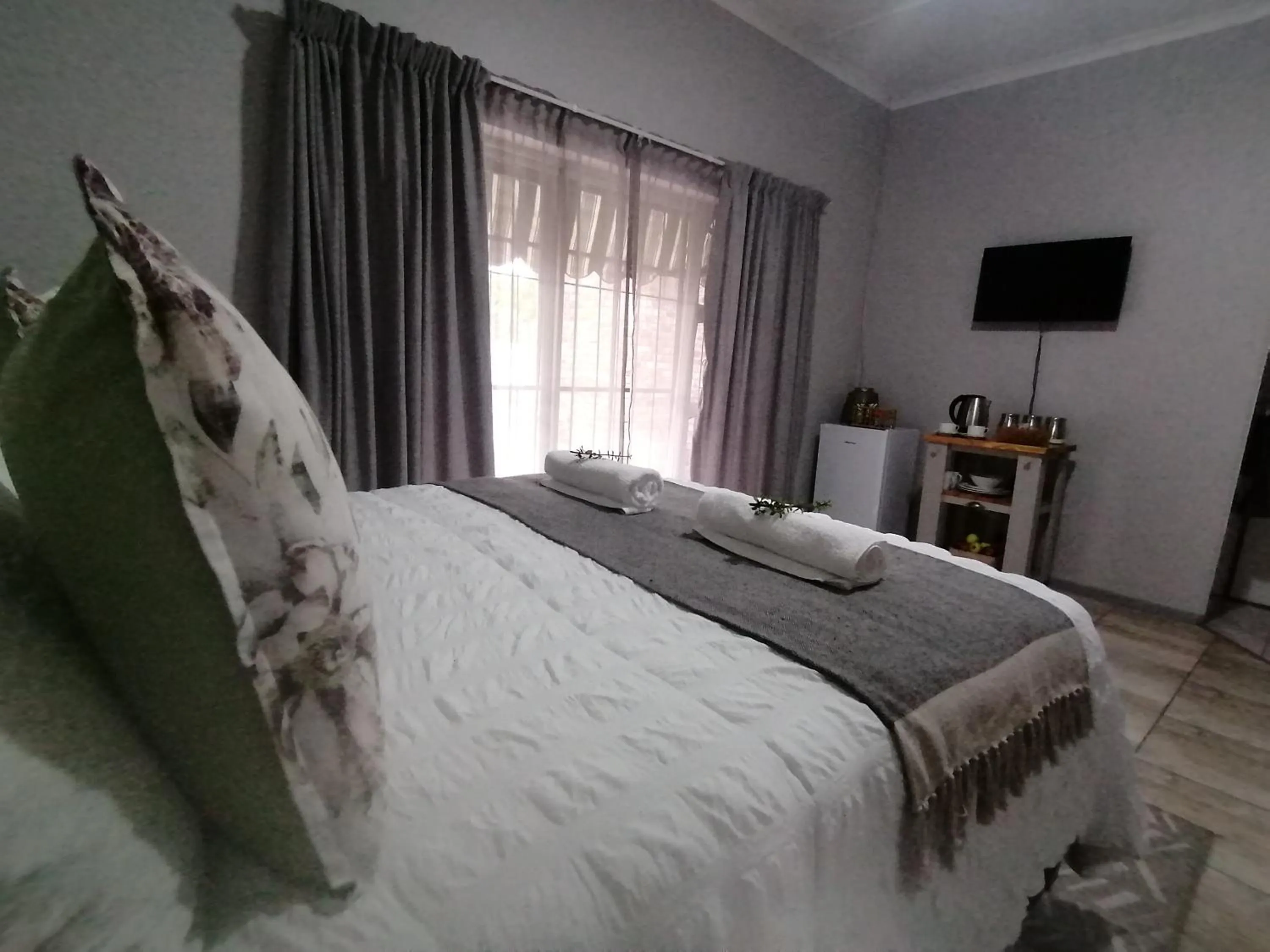 Bed in Oppi Draai Guesthouse