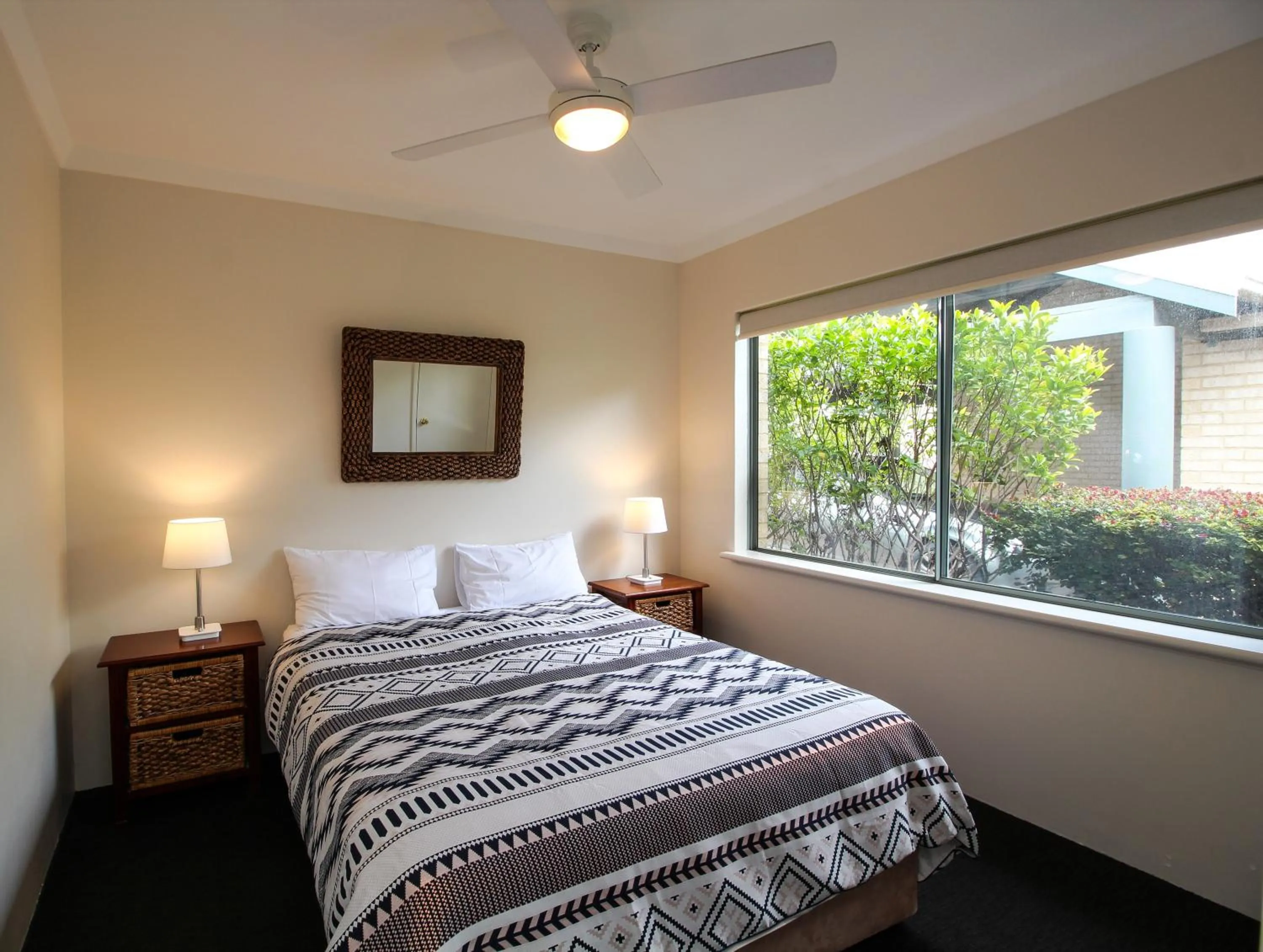 Bed in Bayshore Beachside Resort