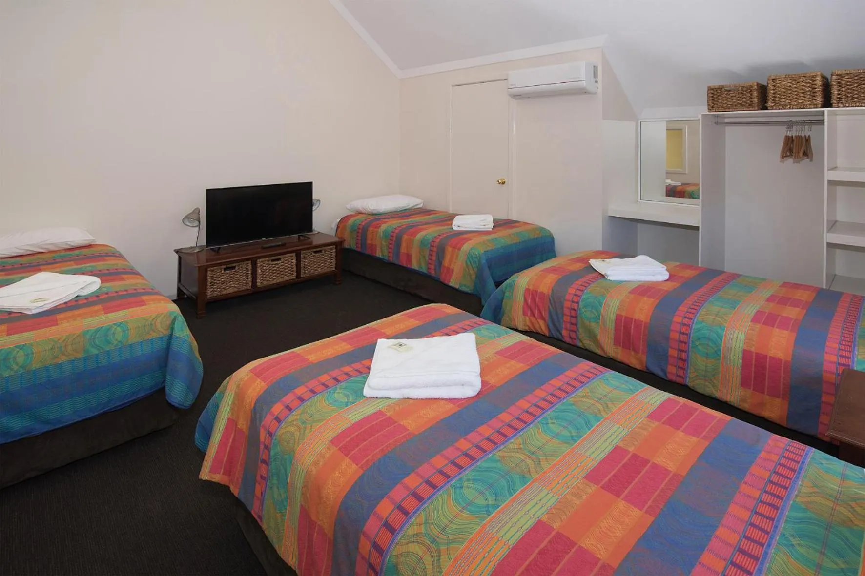 Bed in Bayshore Beachside Resort