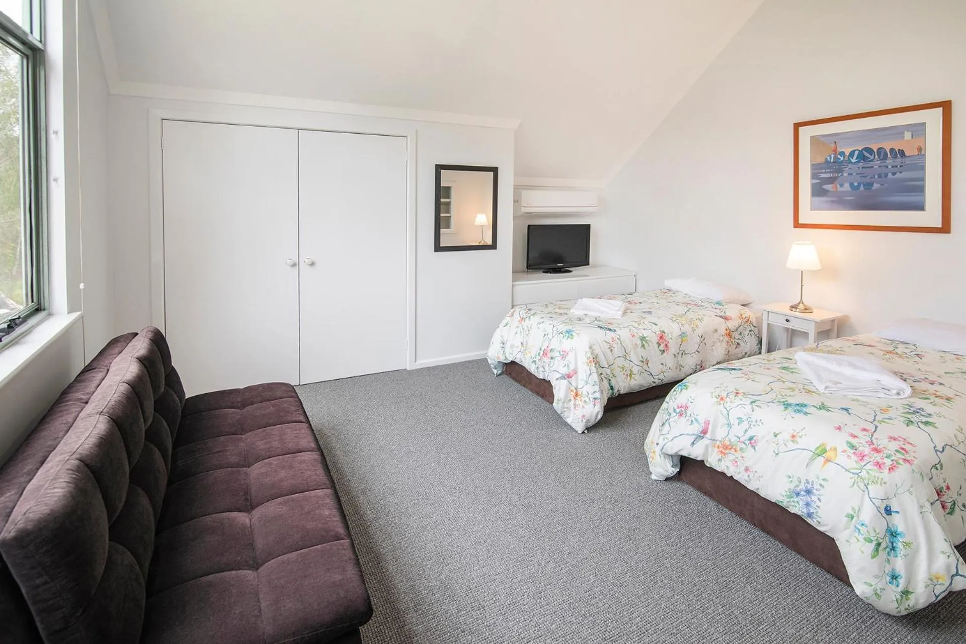 Bed in Bayshore Beachside Resort