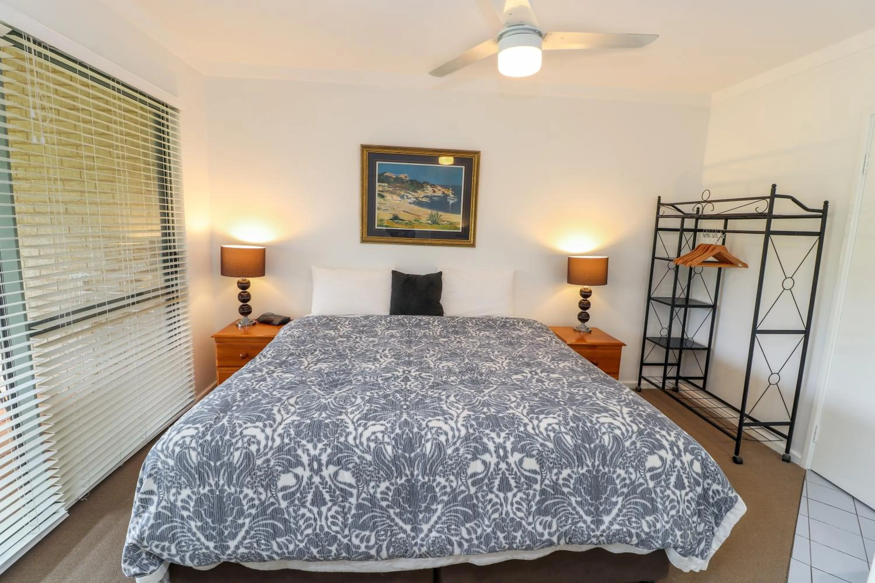 Bed in Bayshore Beachside Resort