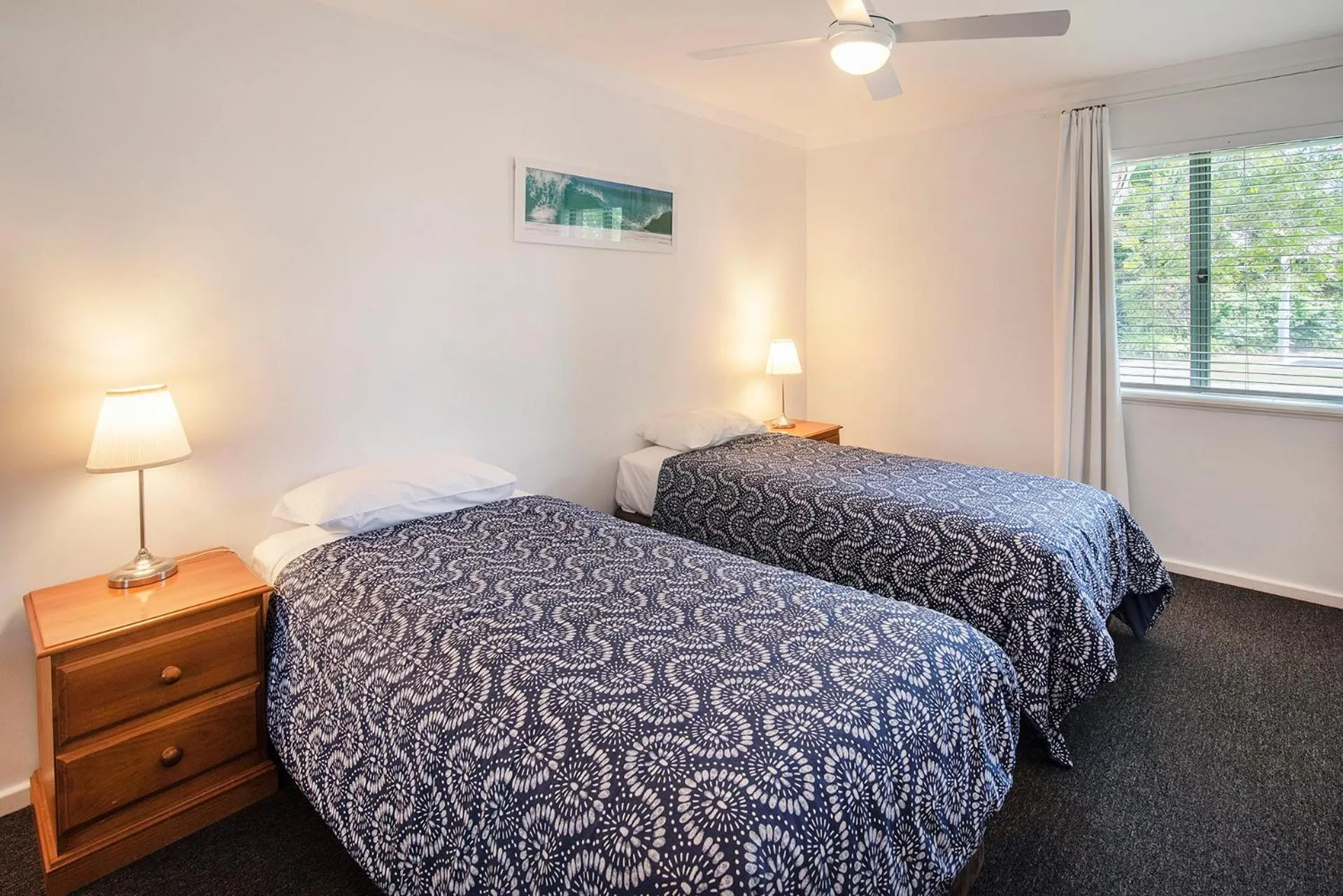 Bed in Bayshore Beachside Resort