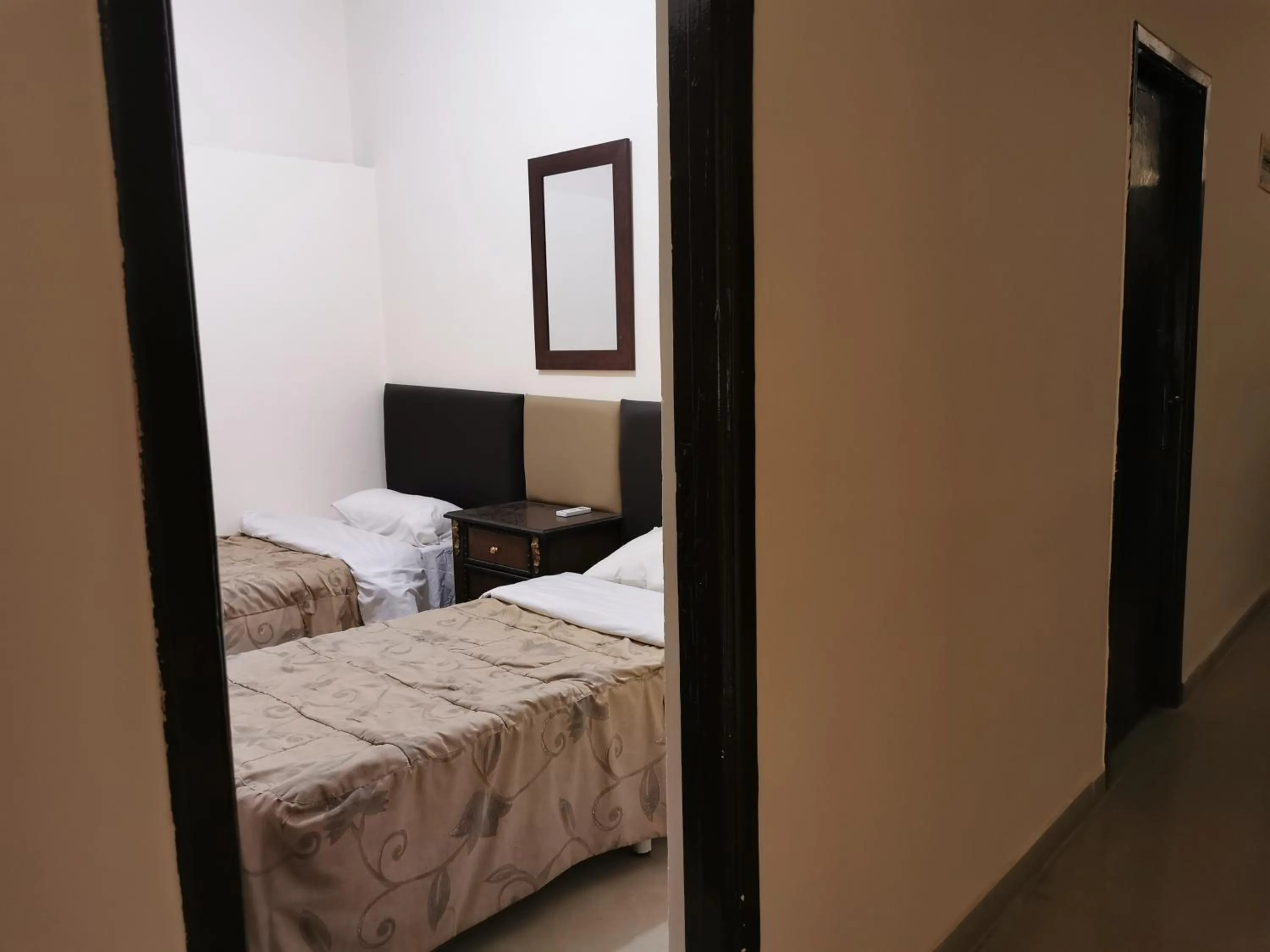 Quiet street view, Bed in Petra Gate Hotel