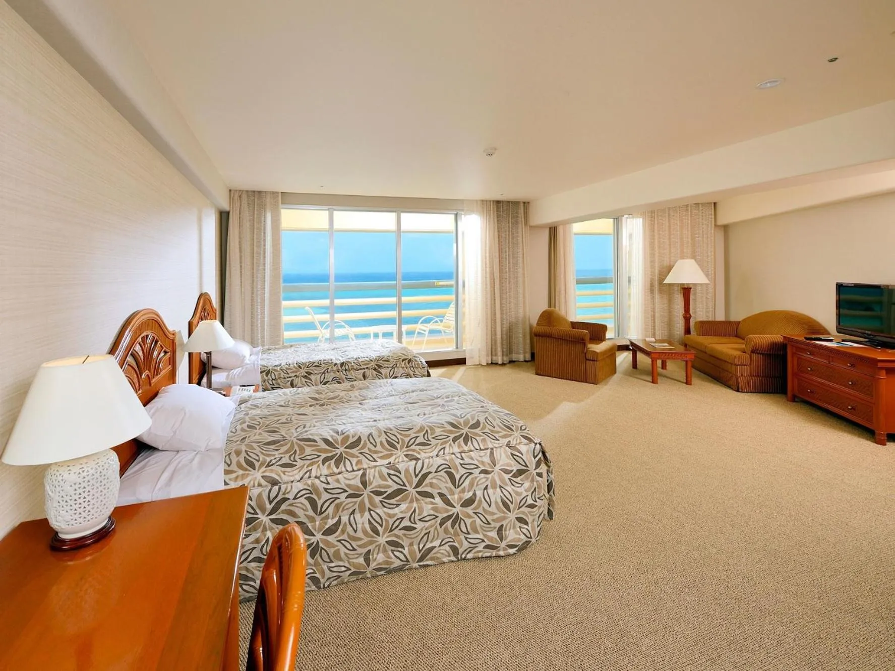 Bed in Rizzan Sea Park Hotel Tancha Bay