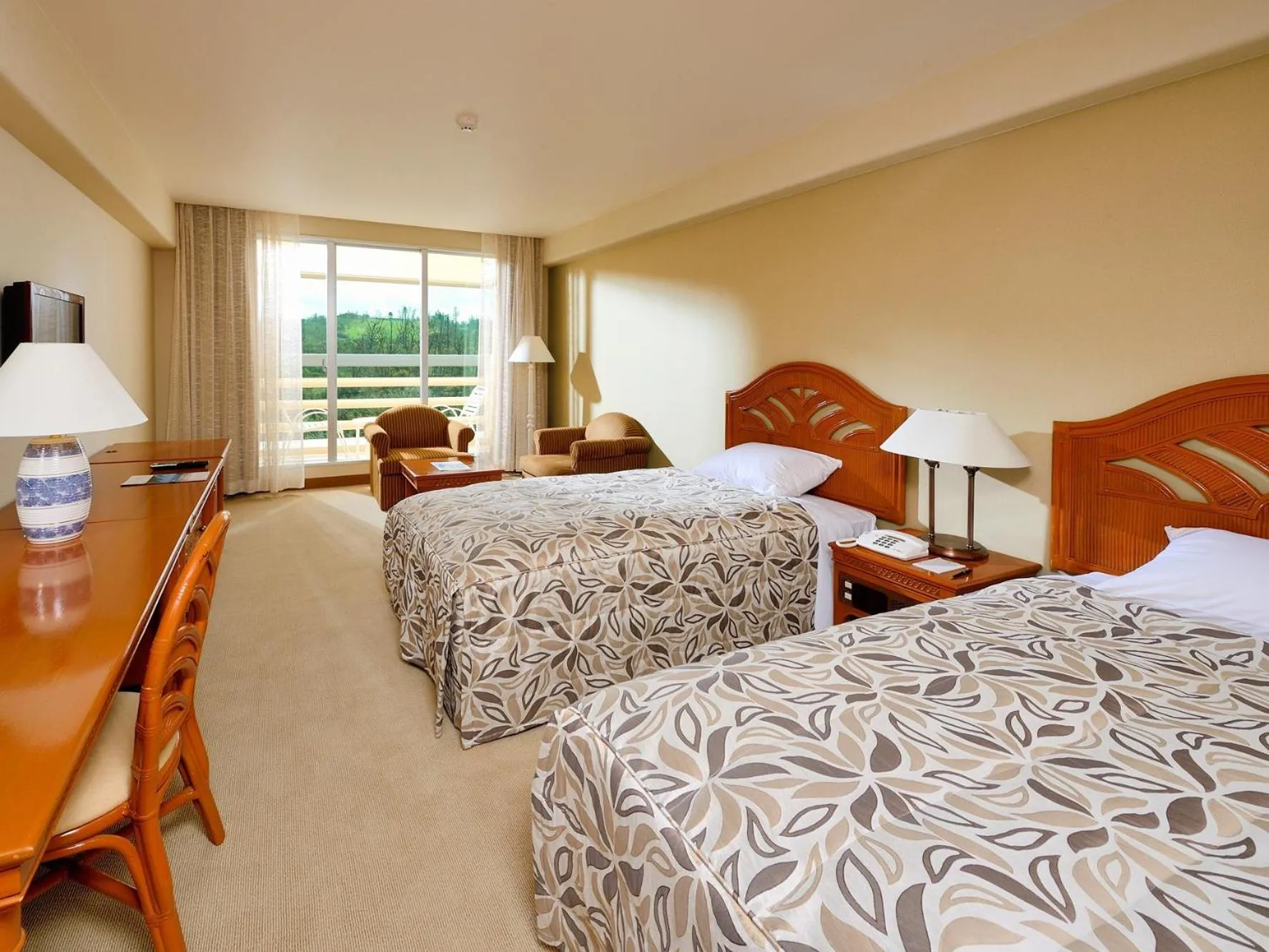 Bed in Rizzan Sea Park Hotel Tancha Bay