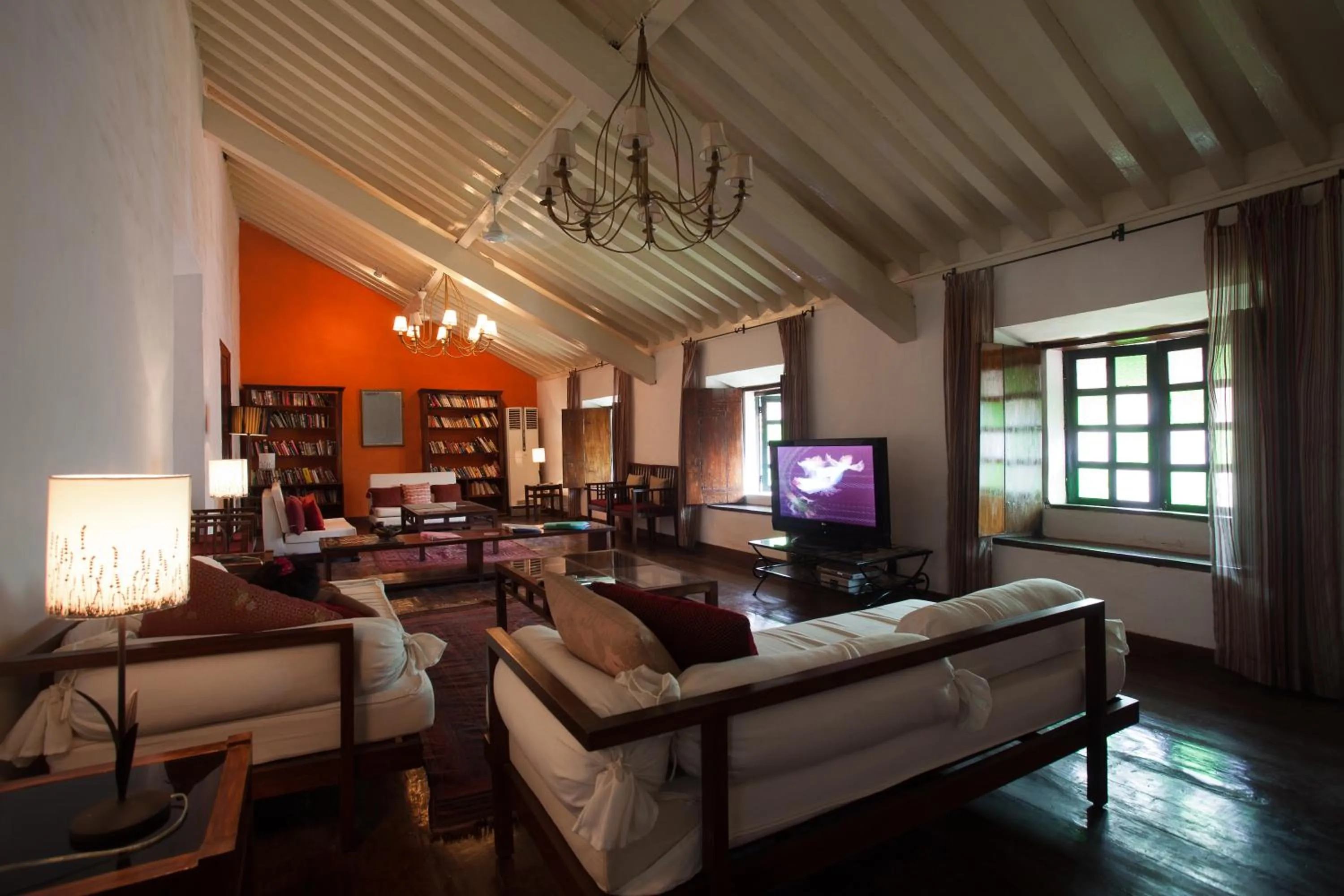 Communal lounge/ TV room in Siolim House