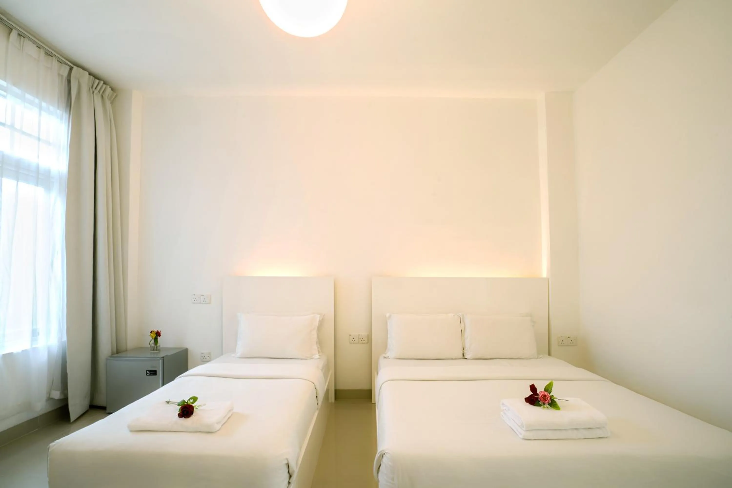 Bed in Chulia Heritage Hotel