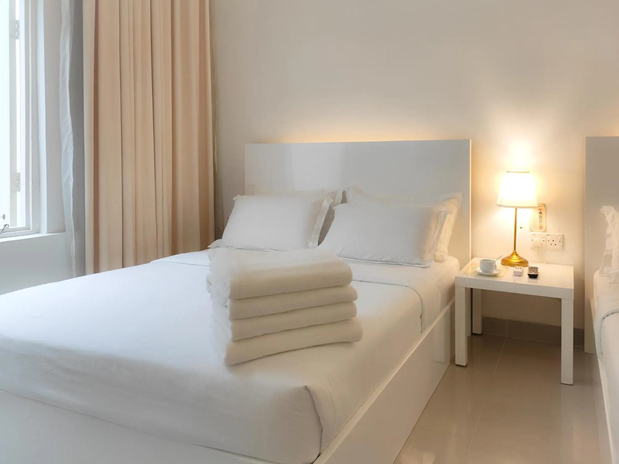 Bed in Chulia Heritage Hotel