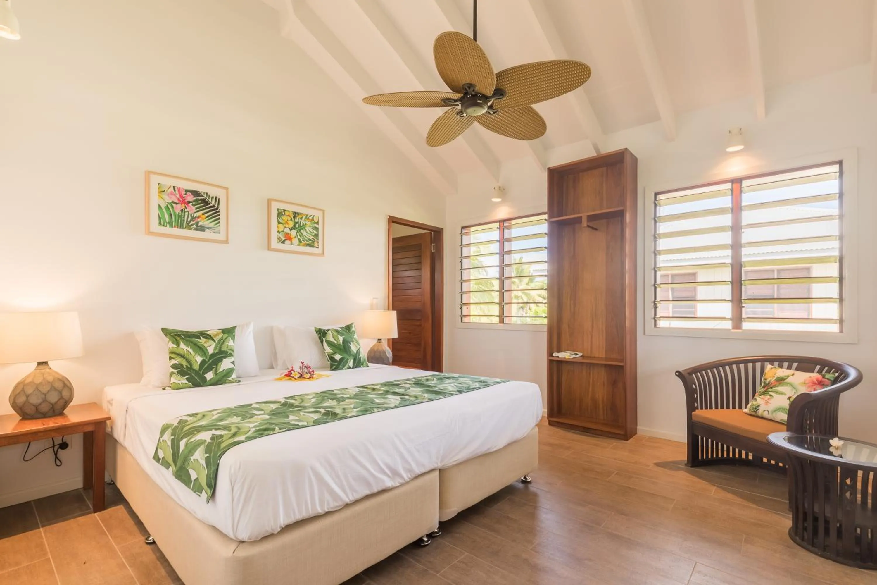 Bed in White Grass Ocean Resort & Spa