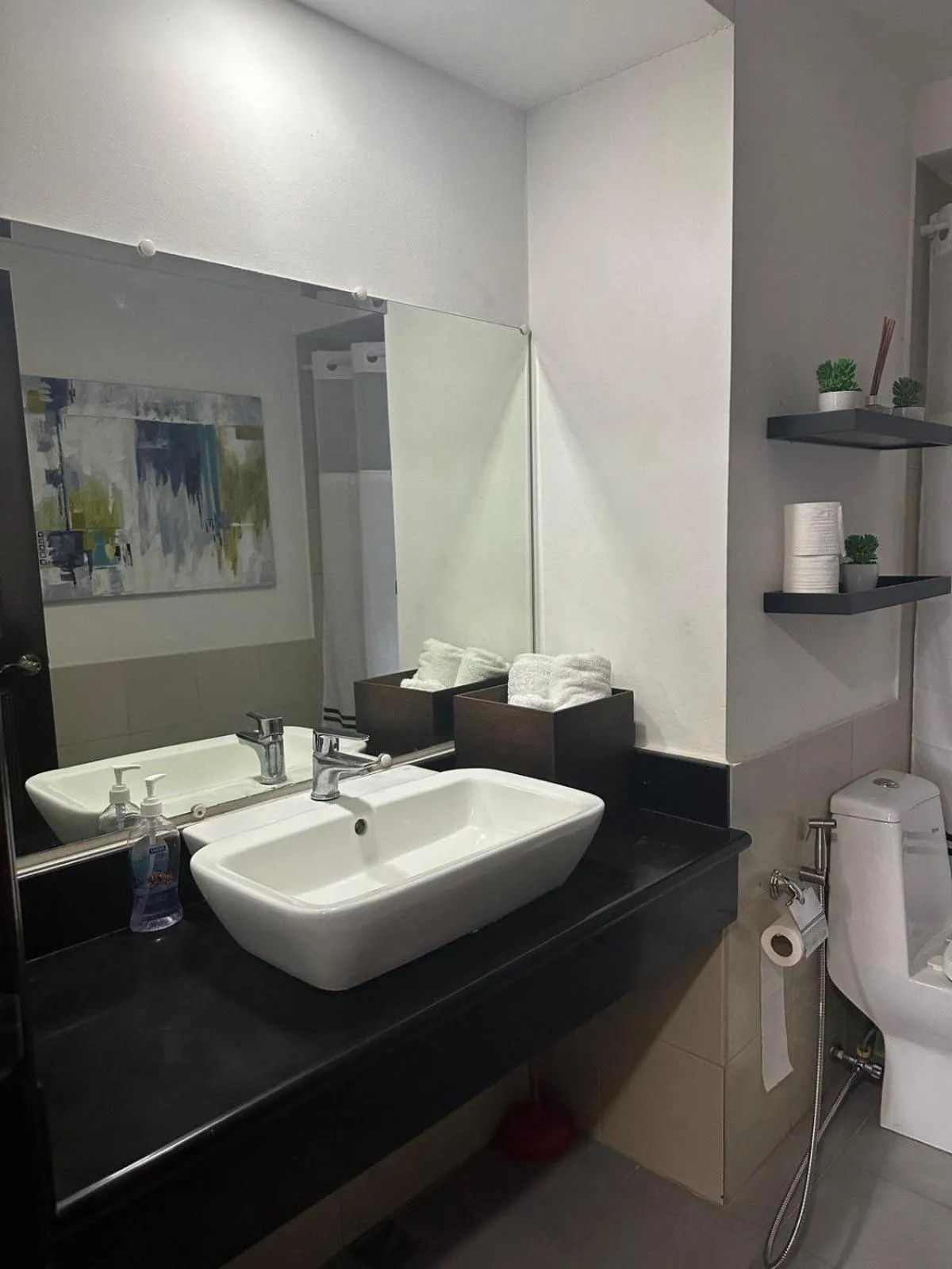 Toilet in Suites de Marina Manila with Netflix