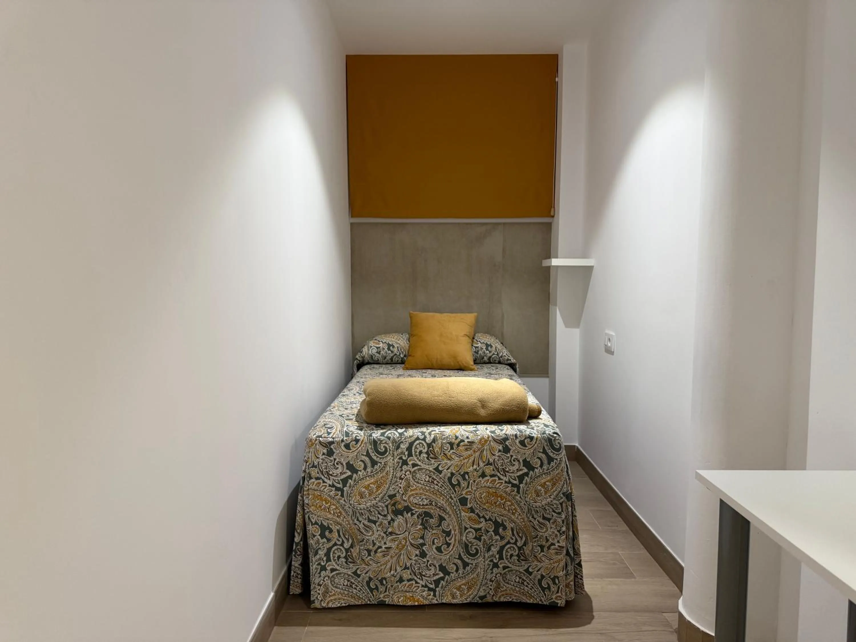 Bed in Hotel Quitagolpe