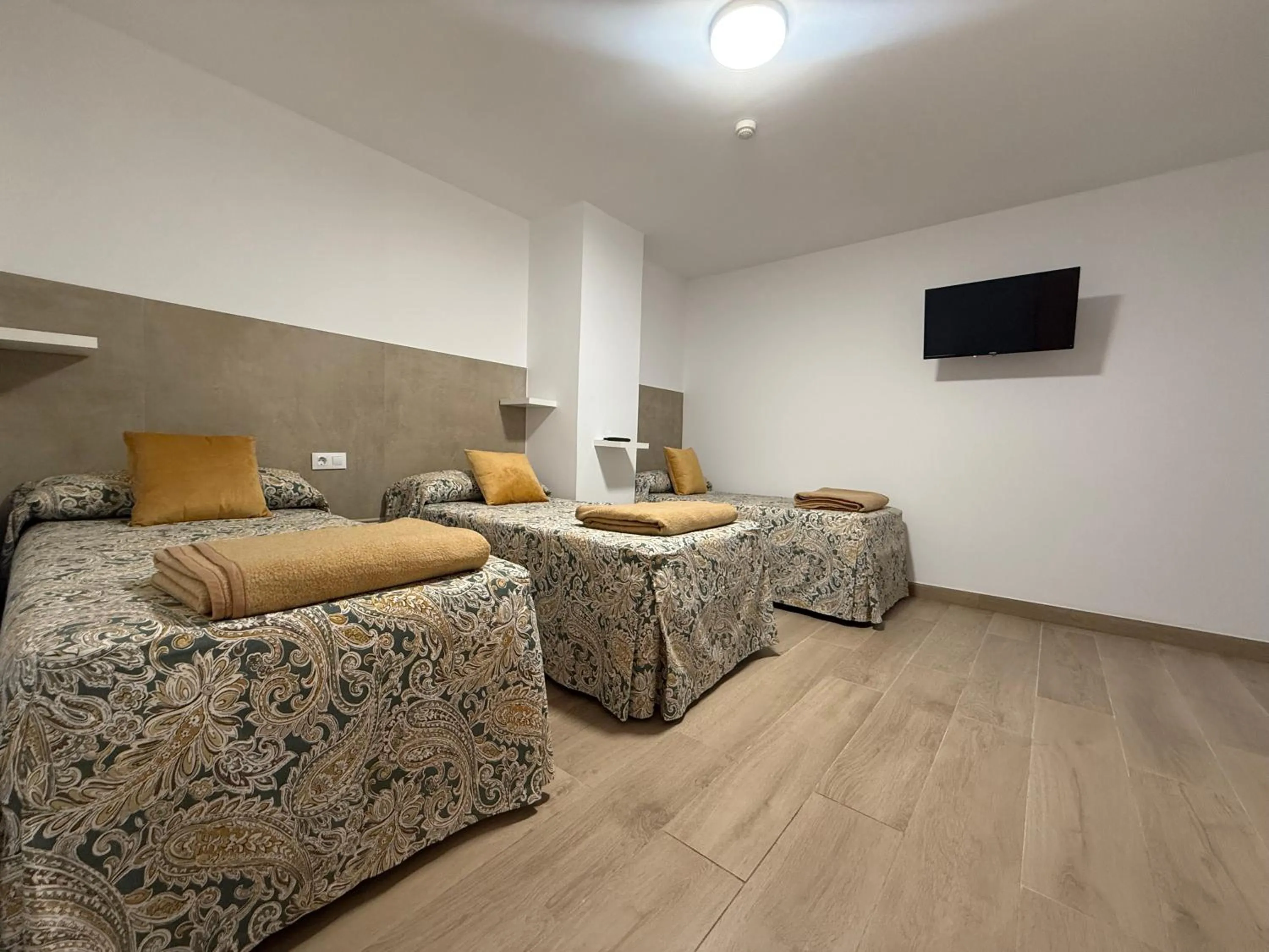 Bed in Hotel Quitagolpe