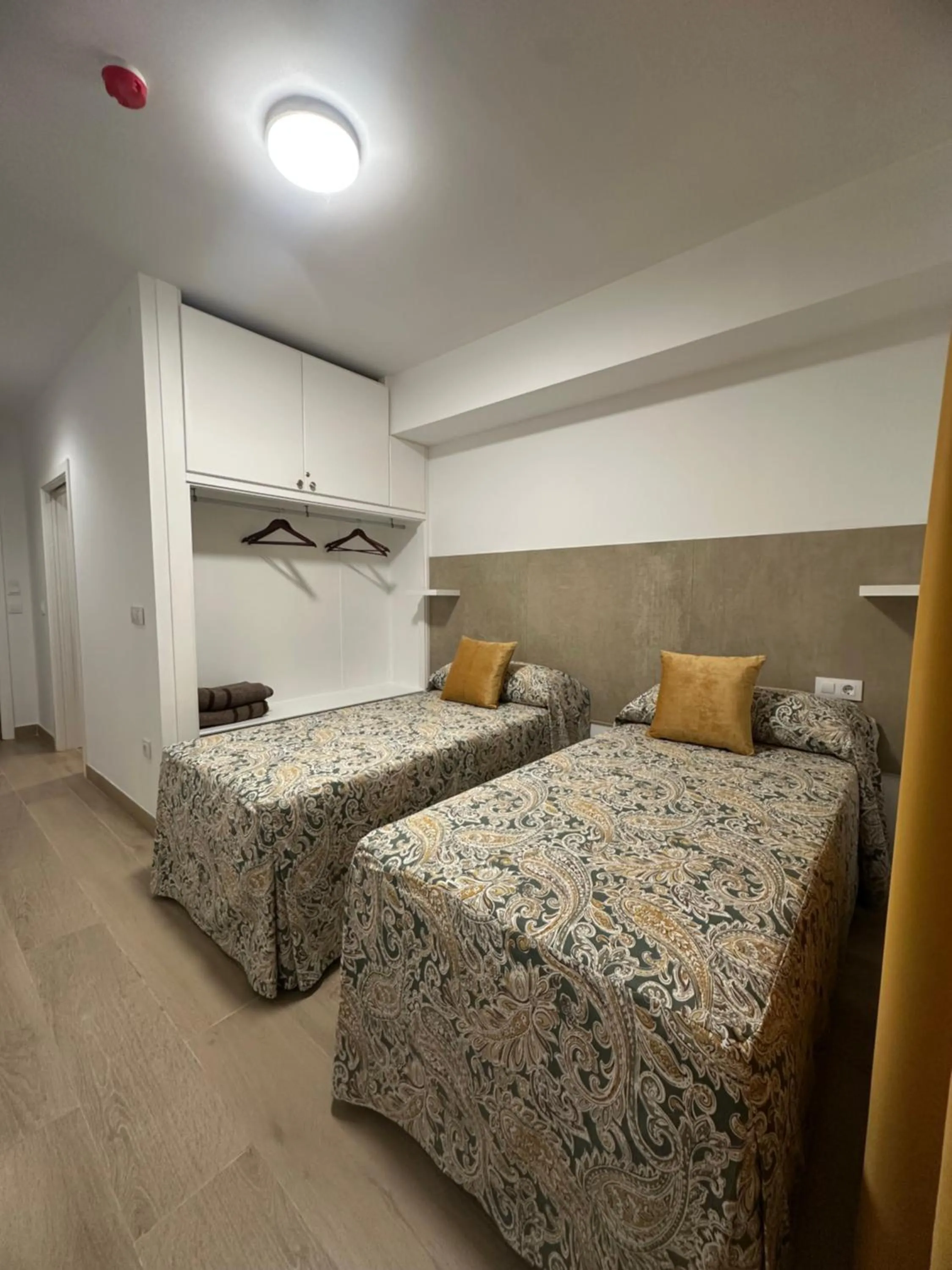 Bed in Hotel Quitagolpe