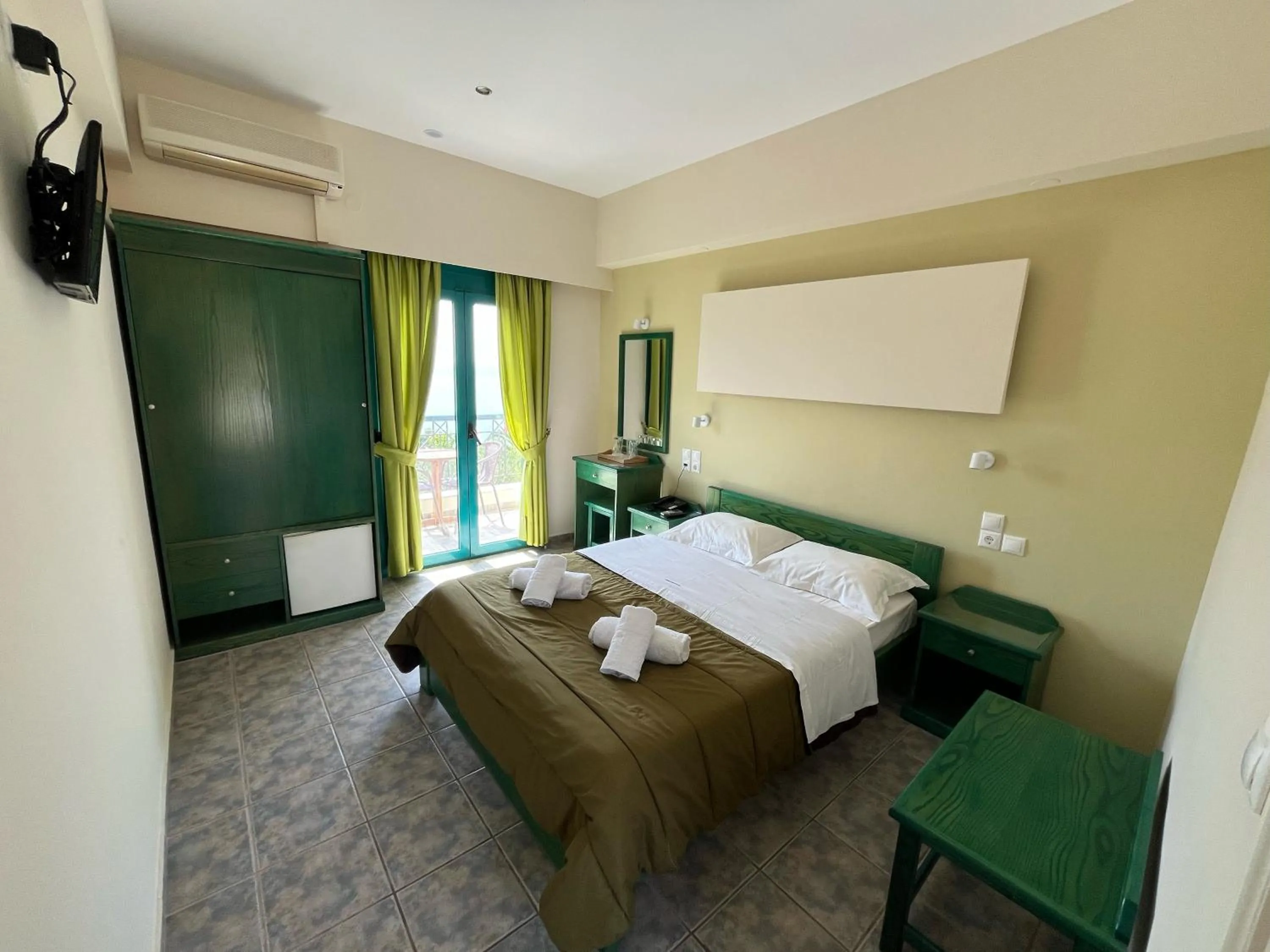 Bed in Angeliki Beach Hotel