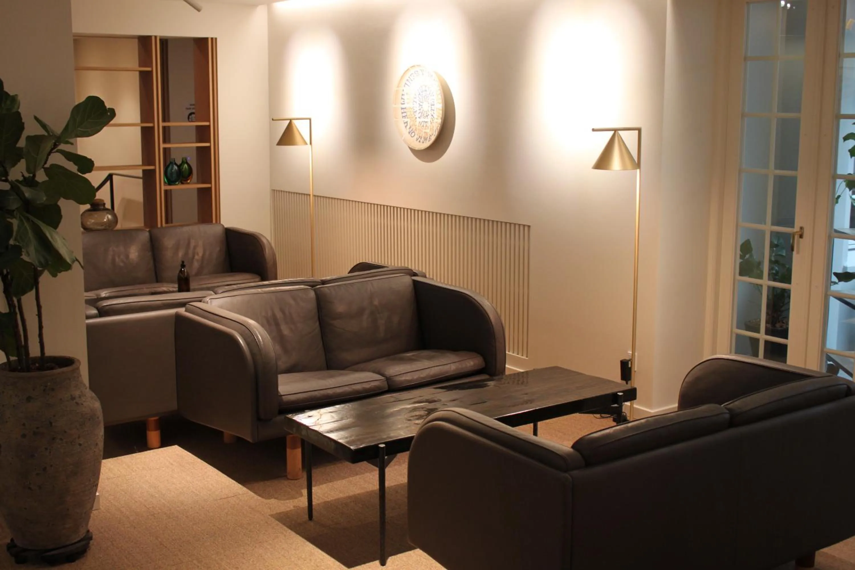 Communal lounge/ TV room in Skarrildhus Sinatur Hotel & Konference