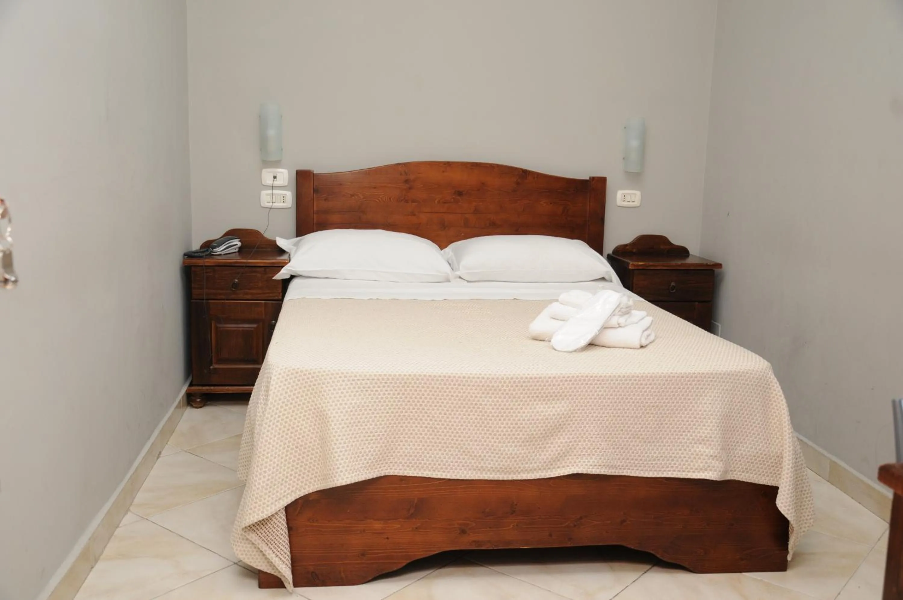 Bed in Hotel Sannita