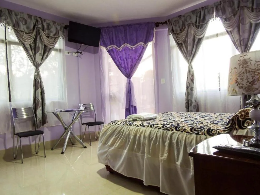 Bed in El Grano De Oro Hotel