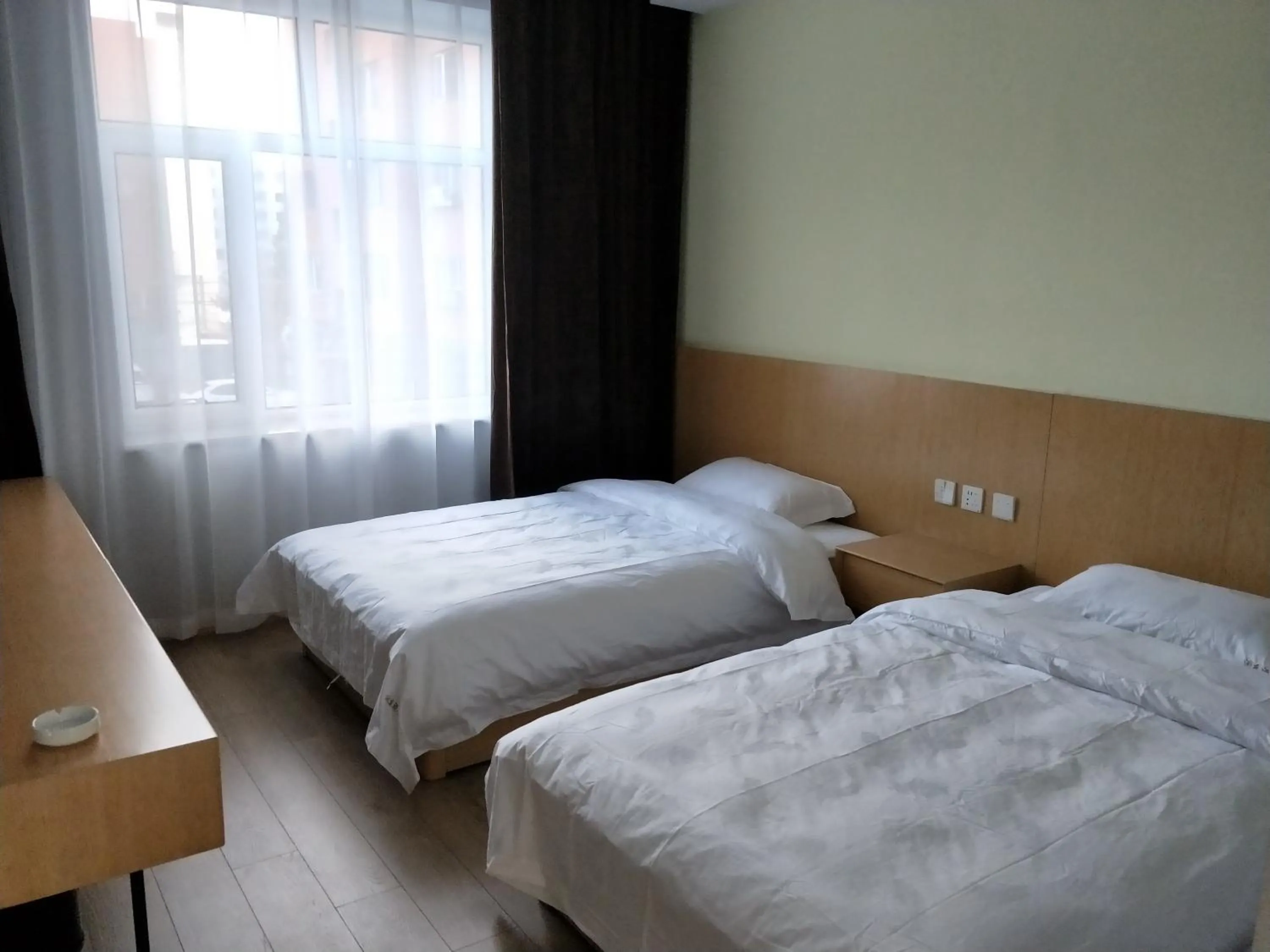 Bed in Lantern Hotel