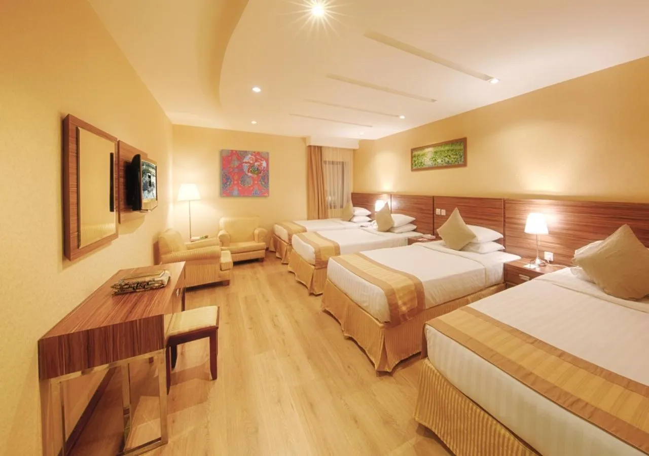 Bed in Al Safwah Orchid Hotel