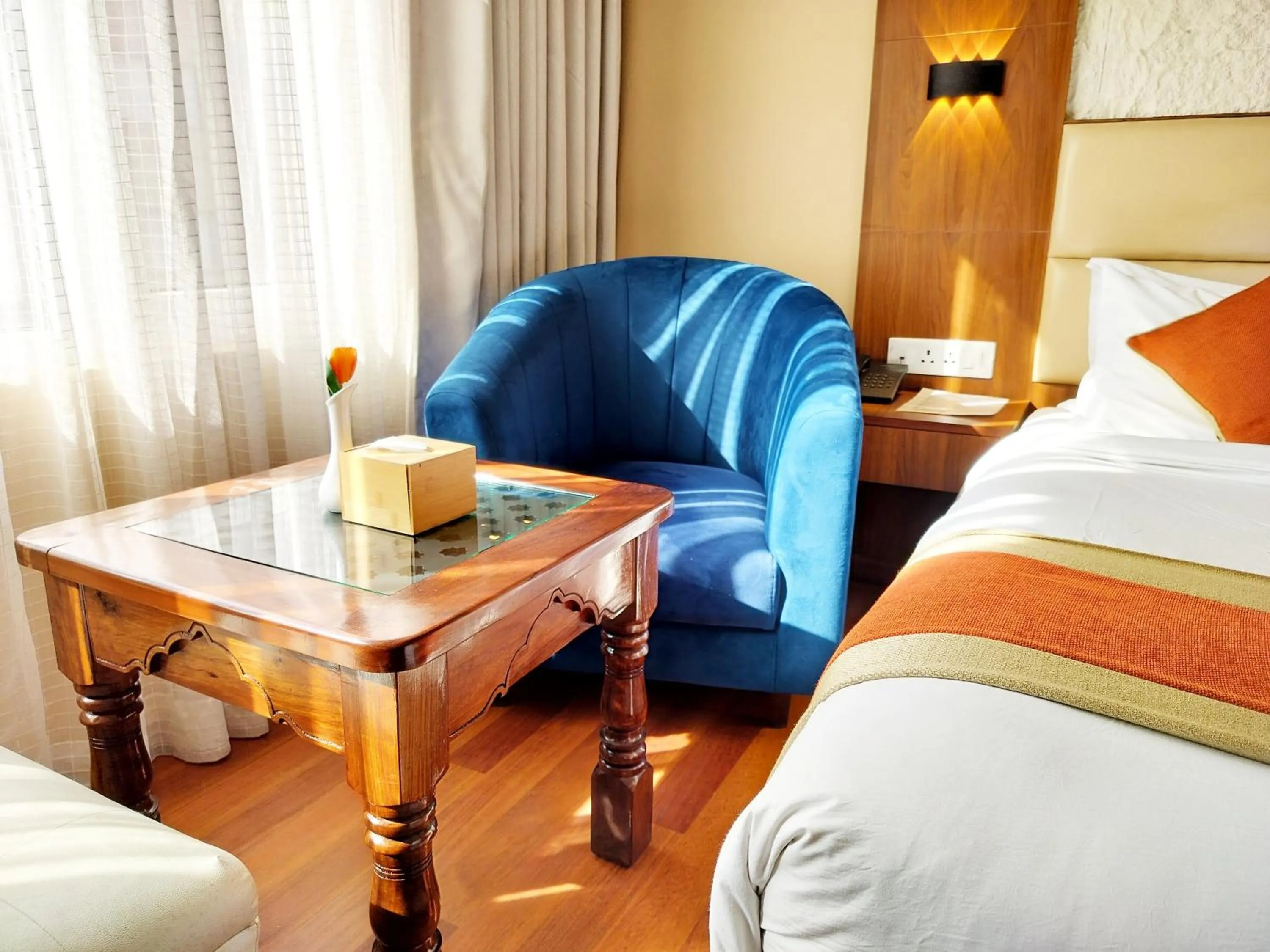 Bed in Kumari Boutique Hotel