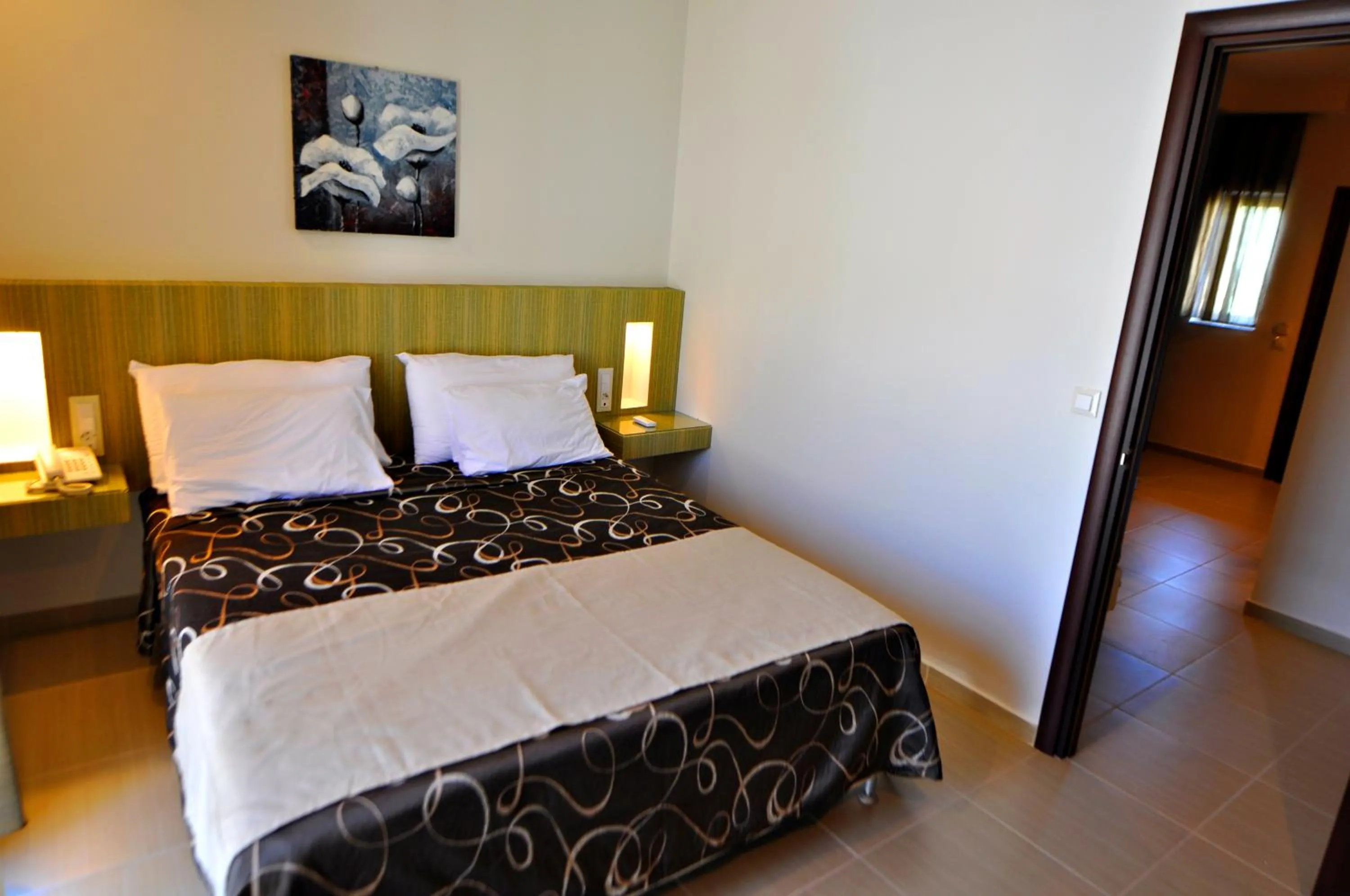 Bed in Tony's Beach Hotel