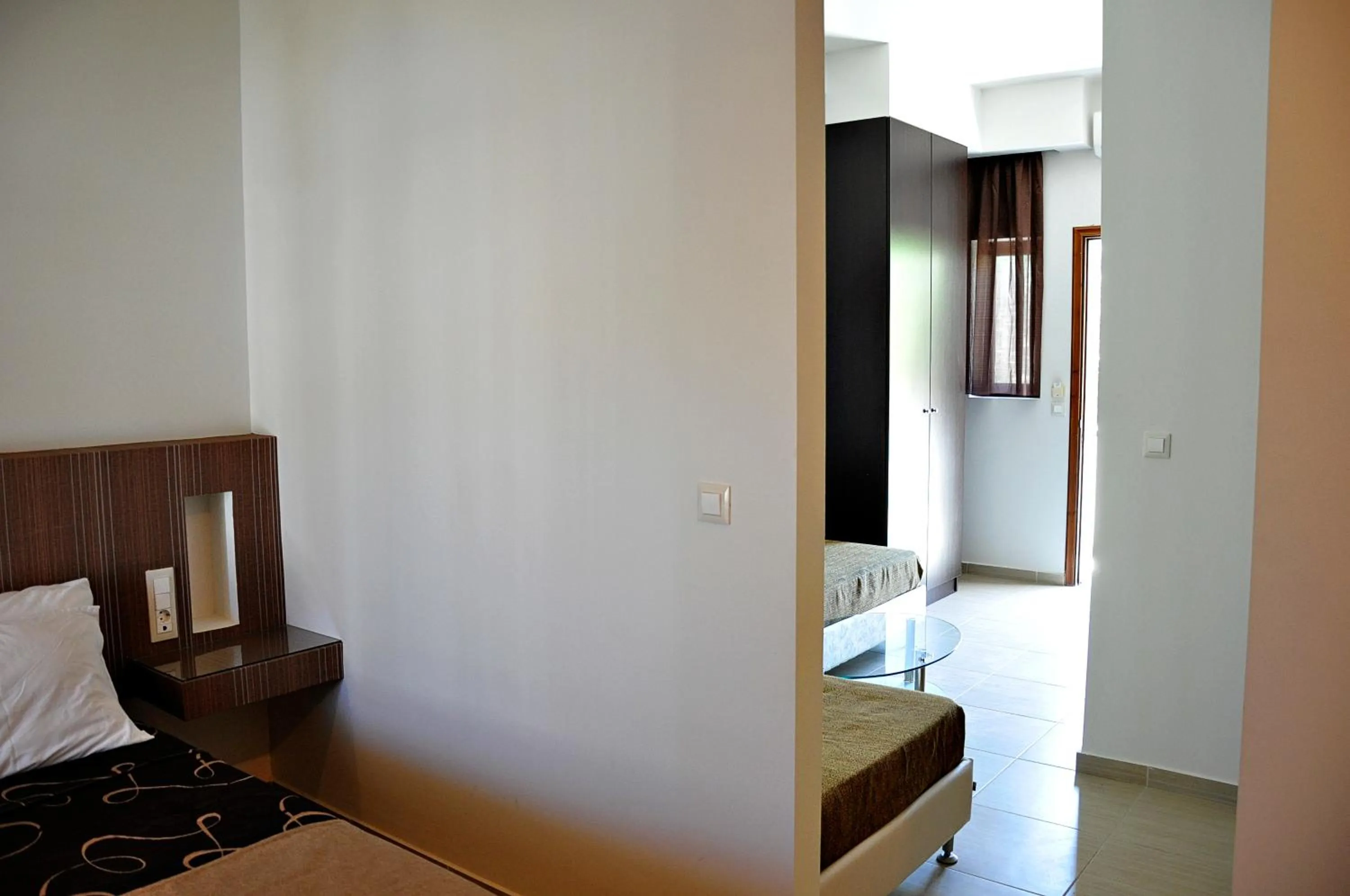 Bed in Tony's Beach Hotel