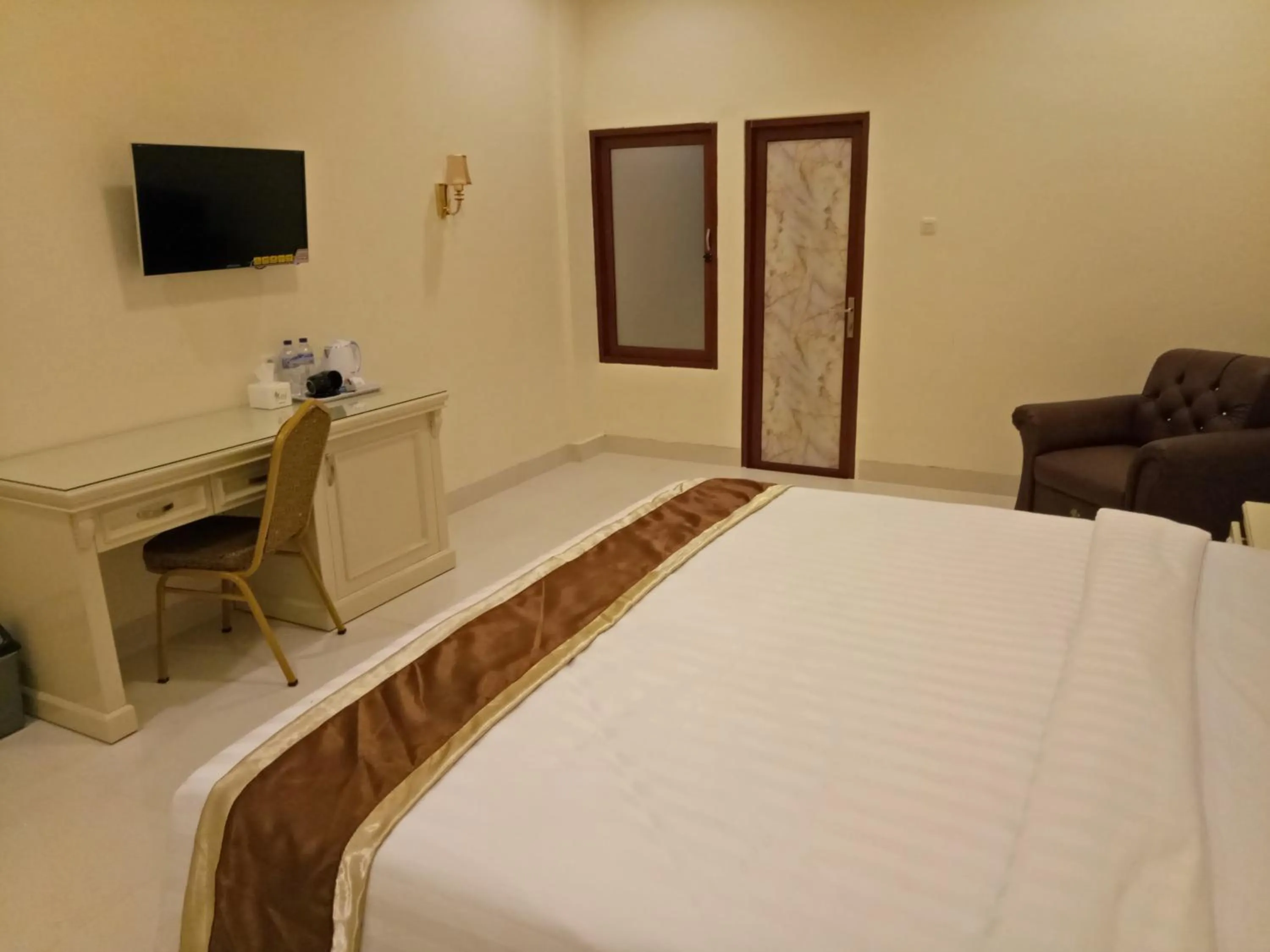 Bed in Grand Town Hotel Mandai