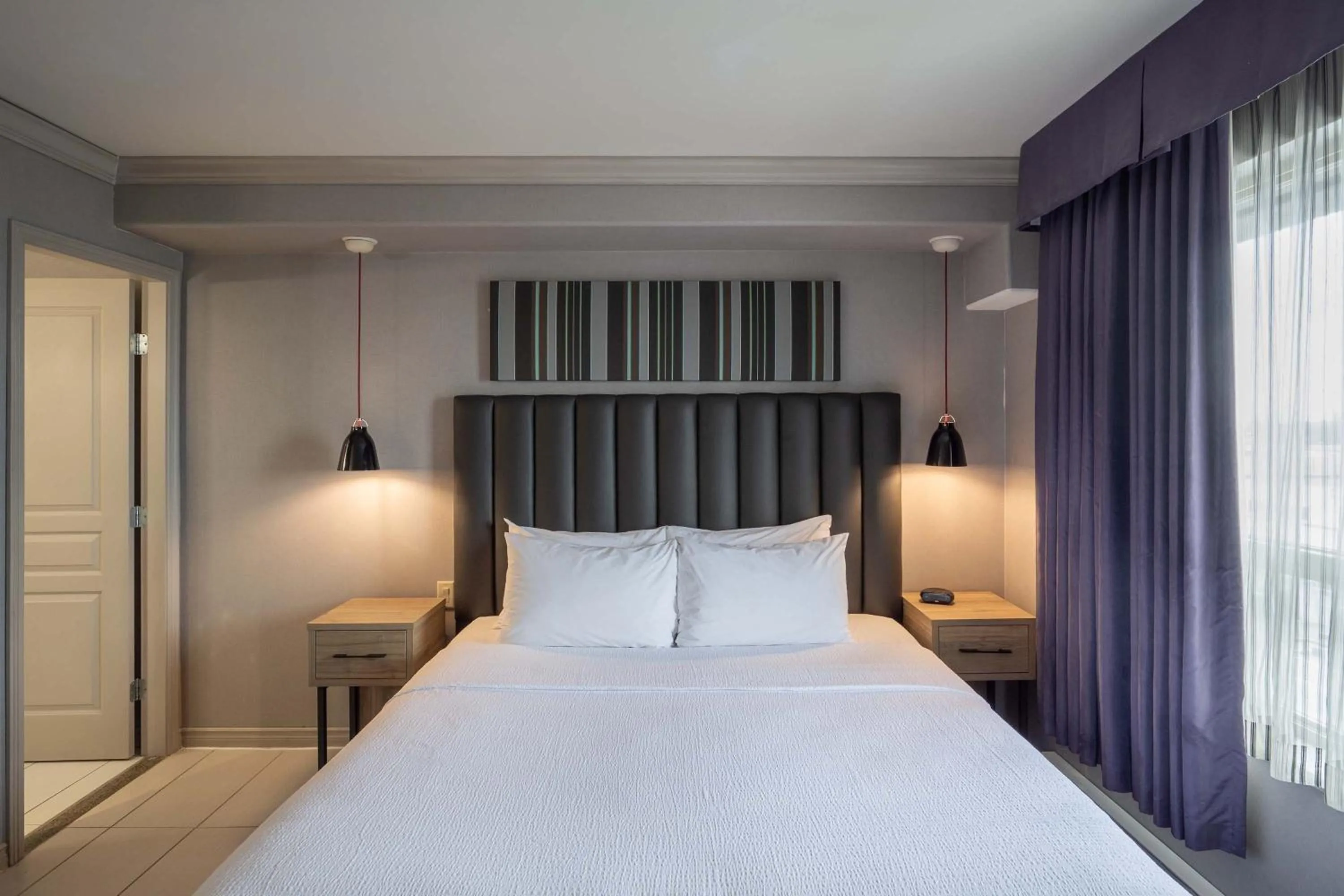 Photo of the whole room, Bed in Sandman Hotel & Suites Winnipeg Airport