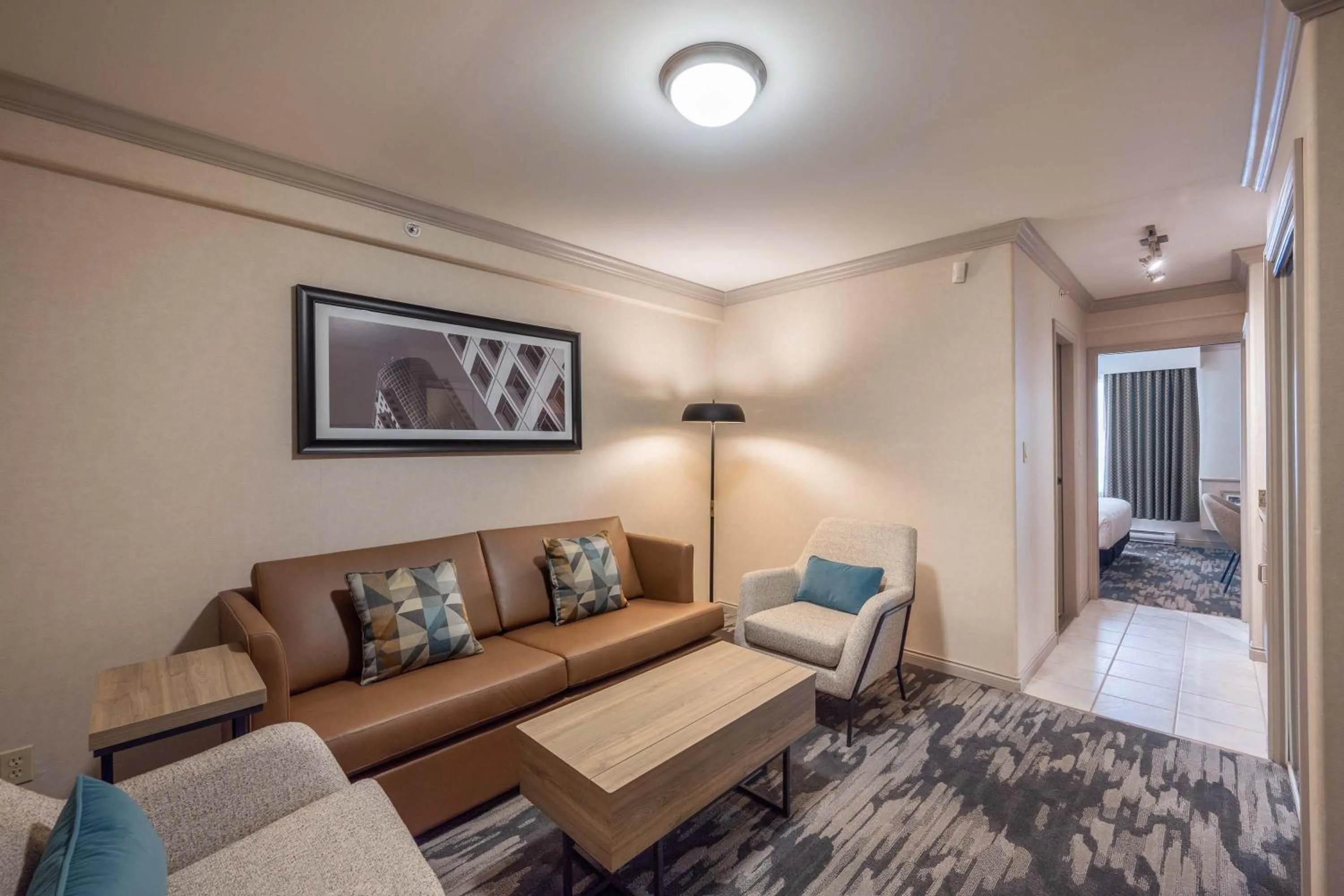 Photo of the whole room, Bed in Sandman Hotel & Suites Winnipeg Airport