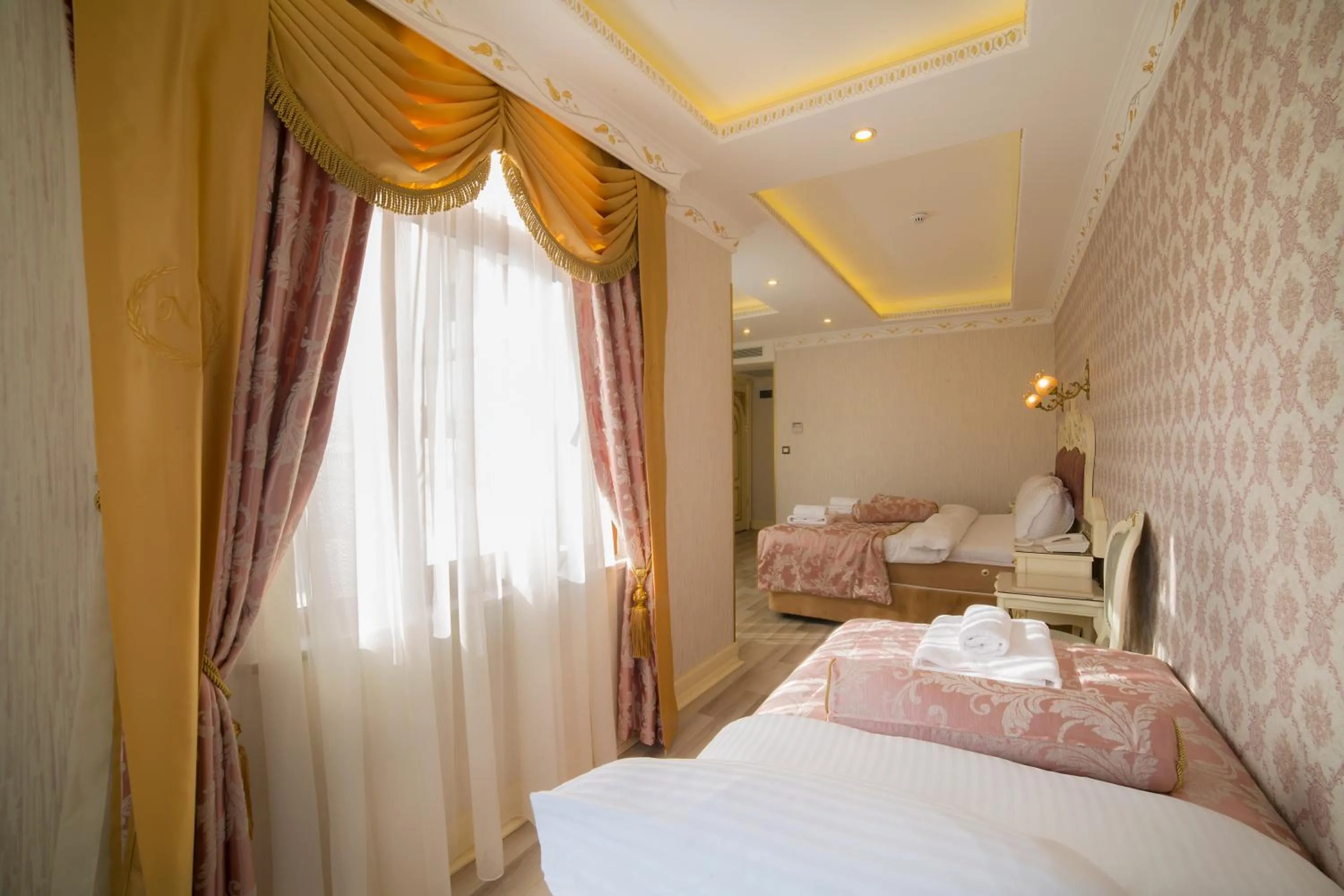 Photo of the whole room, Bed in Nayla Palace Hotel-Special Category