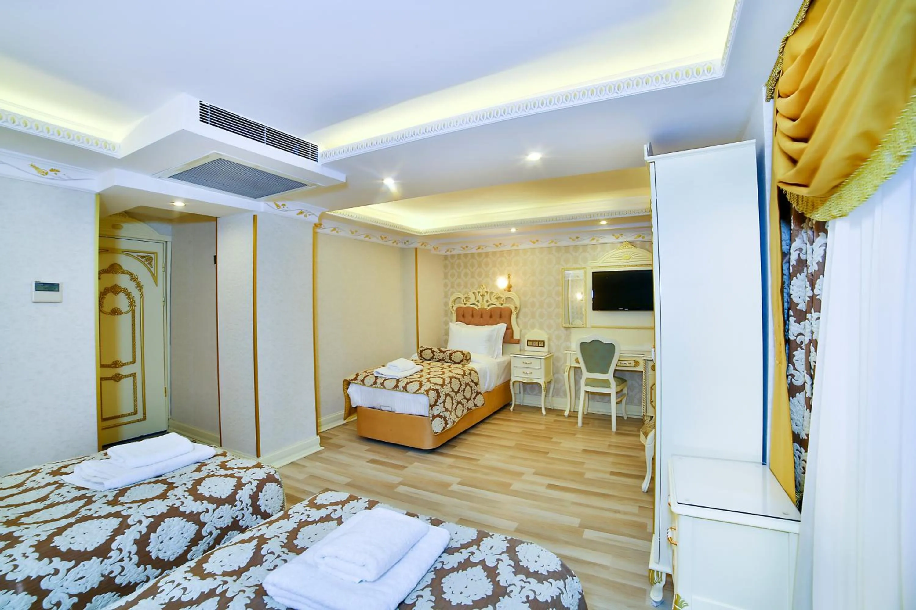 Photo of the whole room, Bed in Nayla Palace Hotel-Special Category