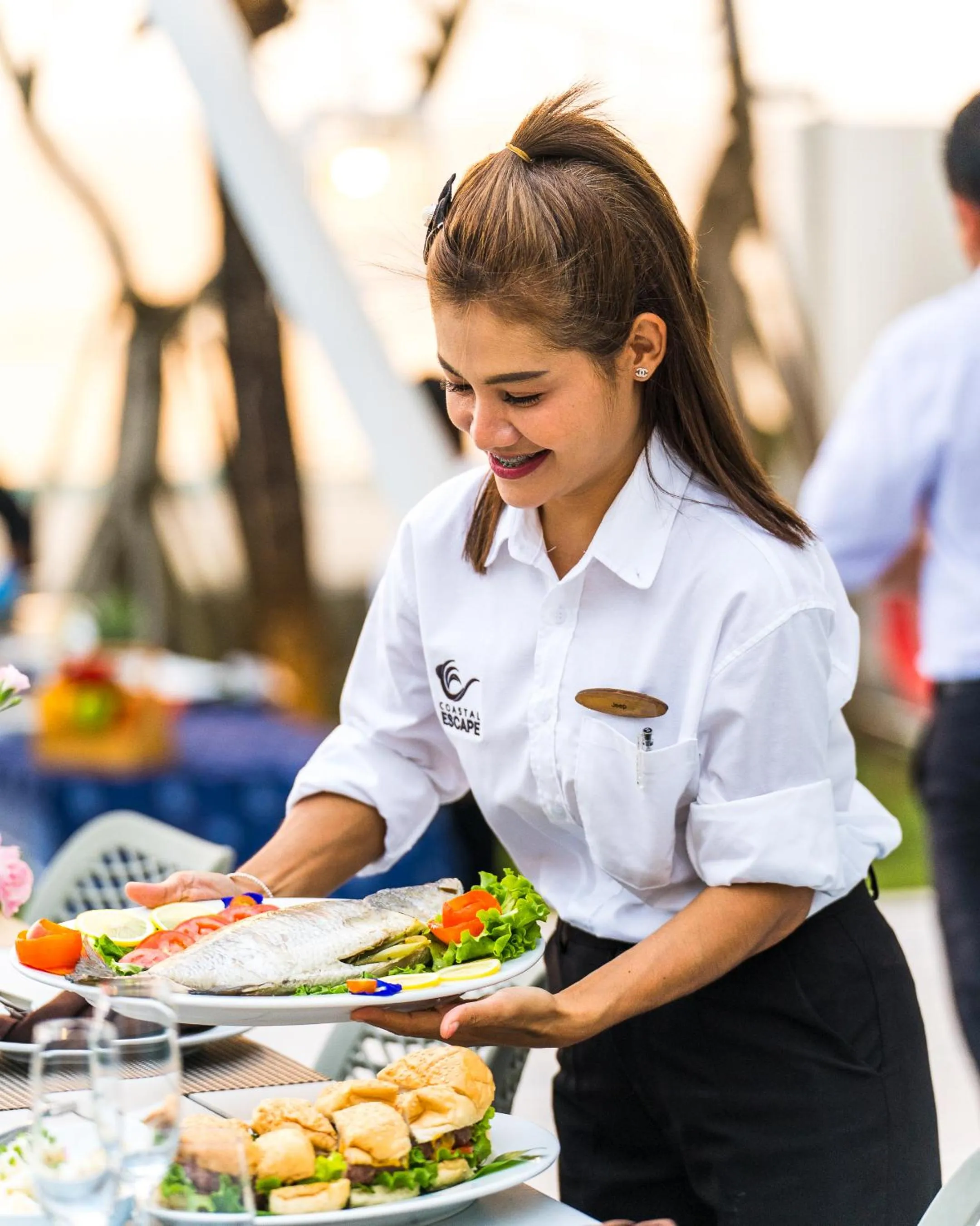 Staff in Coastal Escape Natai