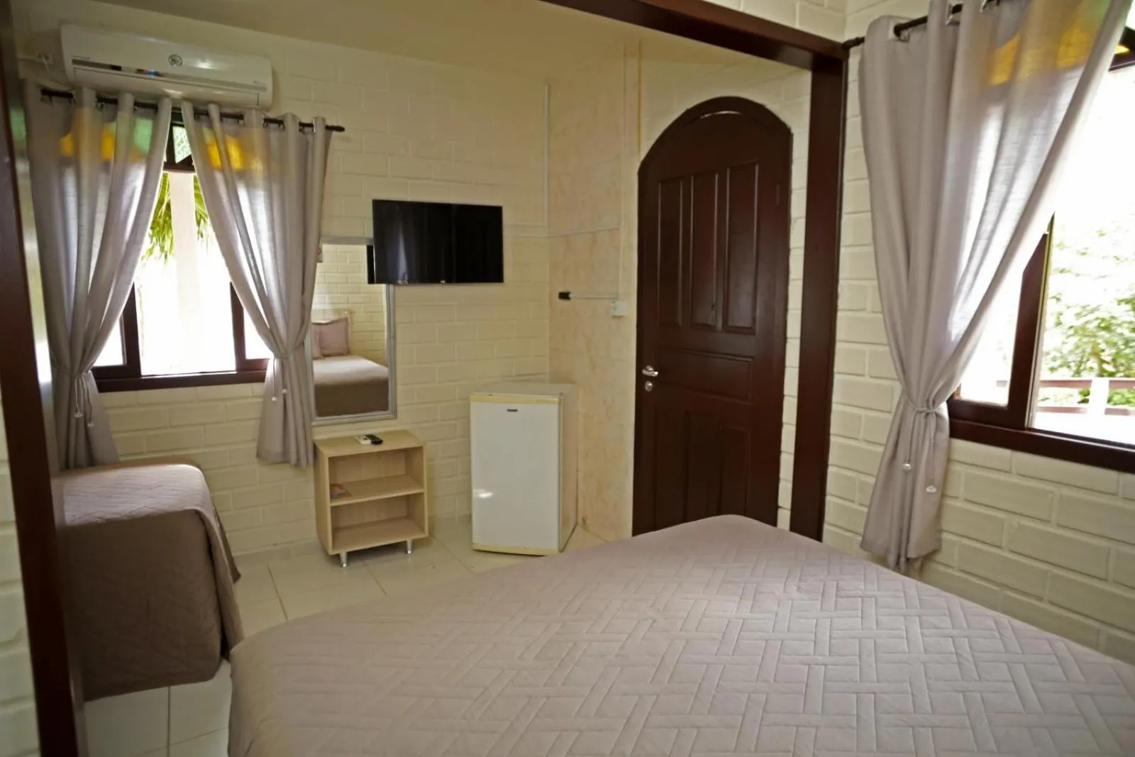 Bed in Pousada Magnus