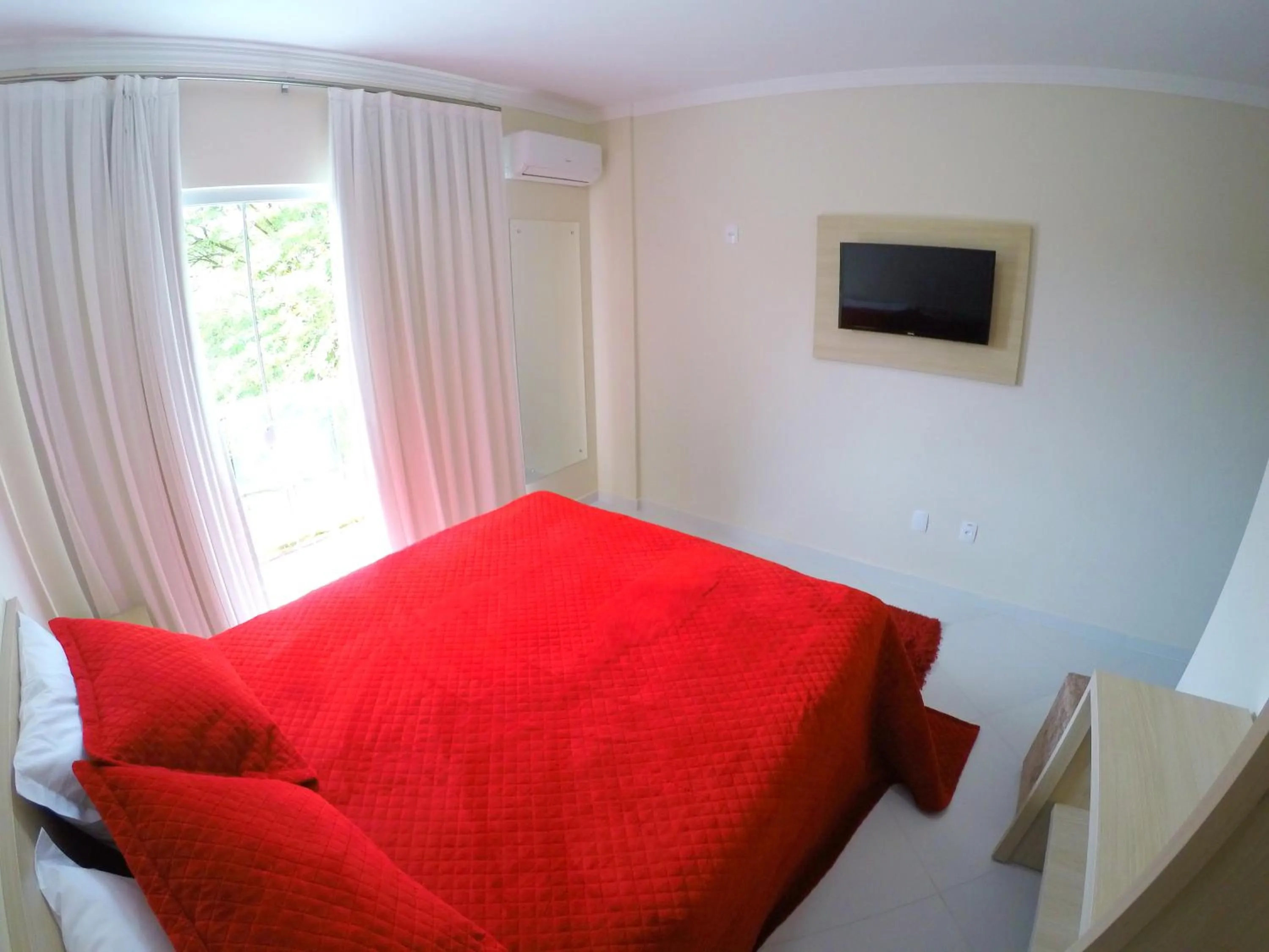 Bed in Pousada Magnus