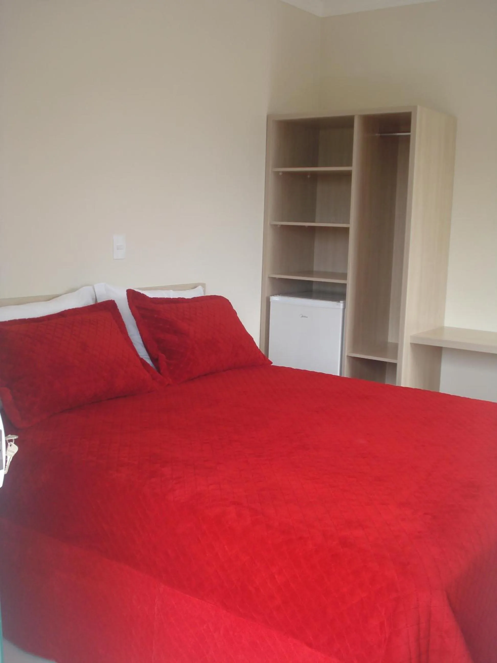 Bed in Pousada Magnus