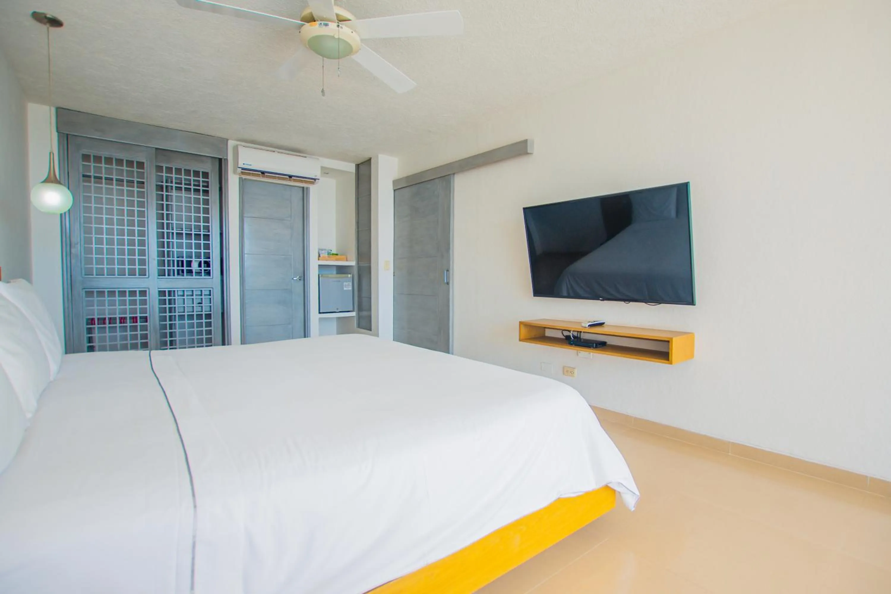 Photo of the whole room, Bed in Tamaca Beach Resort