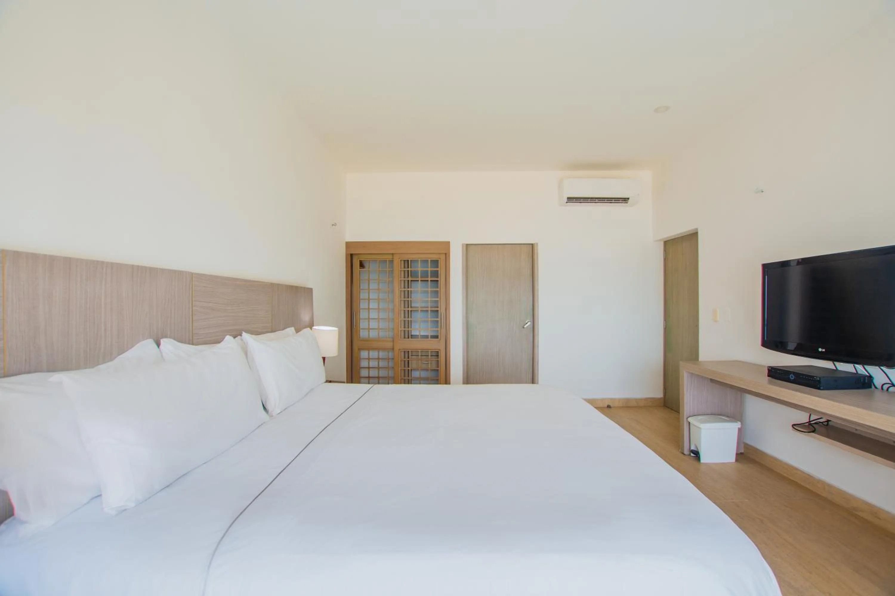 Photo of the whole room, Bed in Tamaca Beach Resort