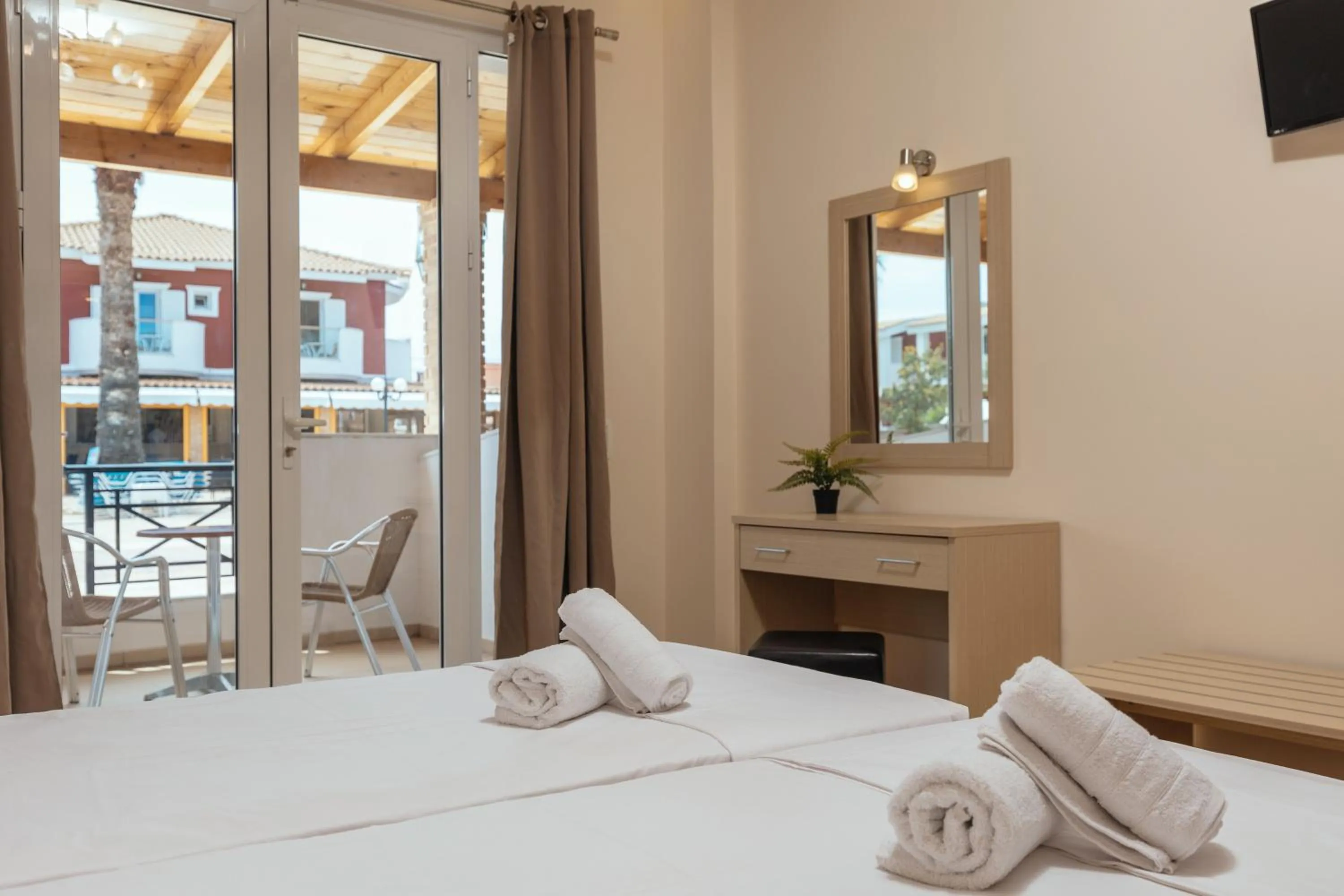 Bed in Yakinthos Hotel