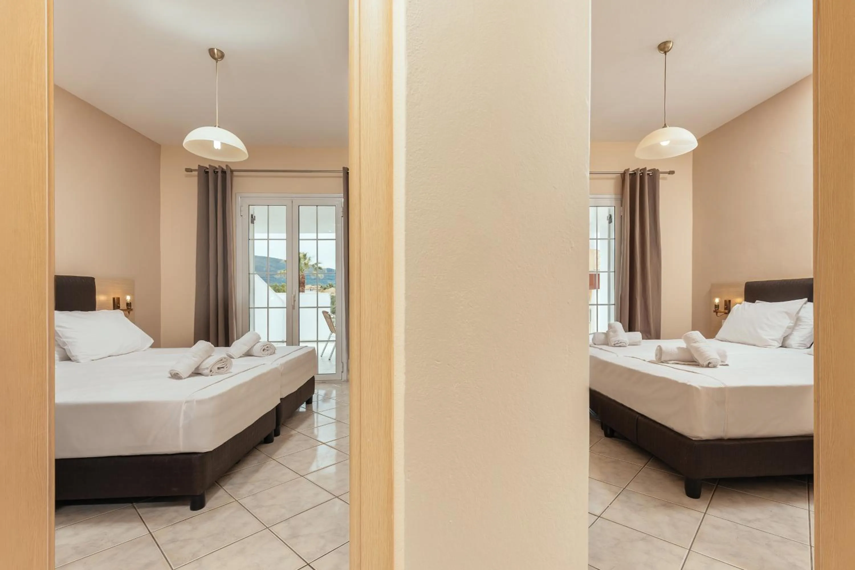 Bed in Yakinthos Hotel