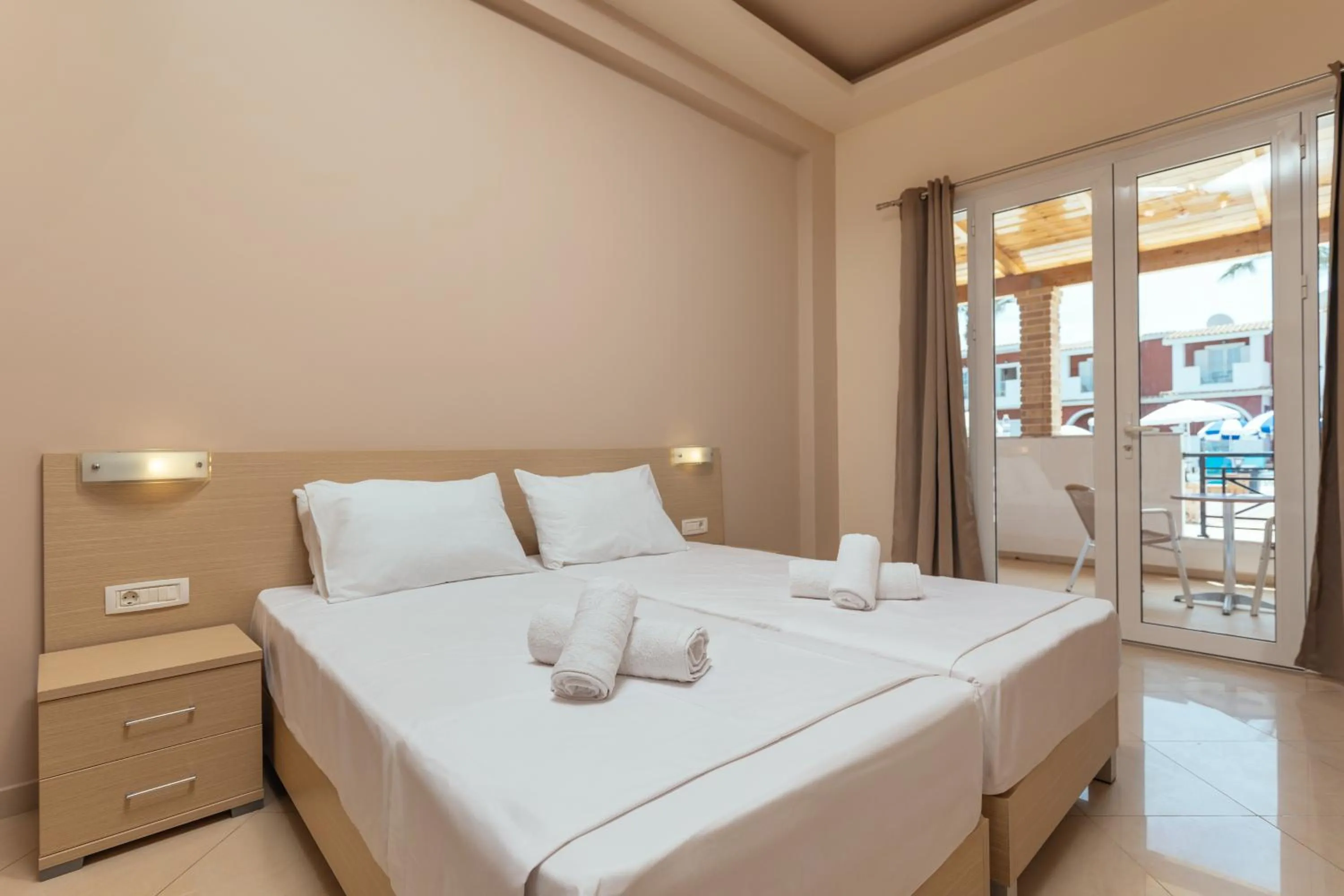 Bed in Yakinthos Hotel