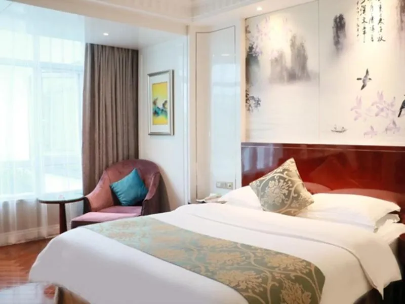 Bed in GreenTree Eastern Yancheng Binhai Oubaoliya City Square Hotel