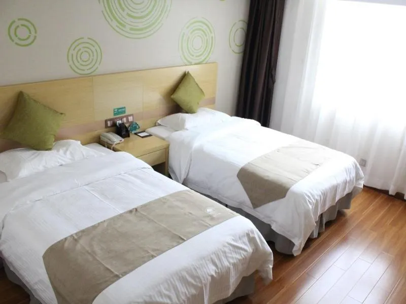 Bed in GreenTree Inn Yangzhou Jiangdu Shaobo Town Huaihai Road Express Hotel