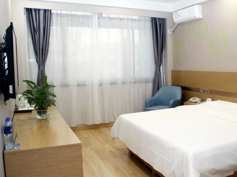 Bed in GreenTree Inn Lvliang Xiaoyi City Fuqian Street Hotel